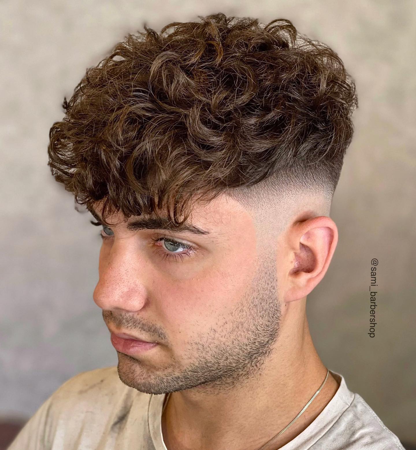 Textured Curly Mohawk with Precision Skin Fade