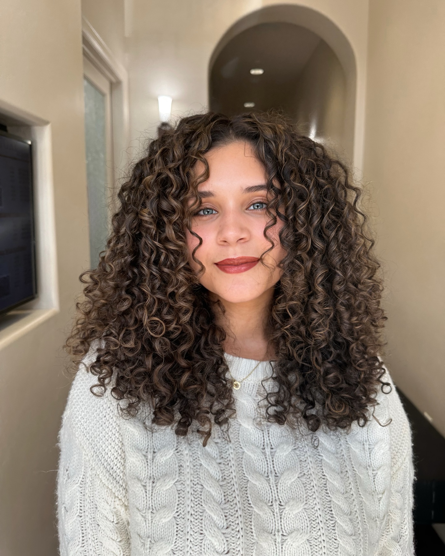 Cascading Chestnut Curls with Dimensional Highlights