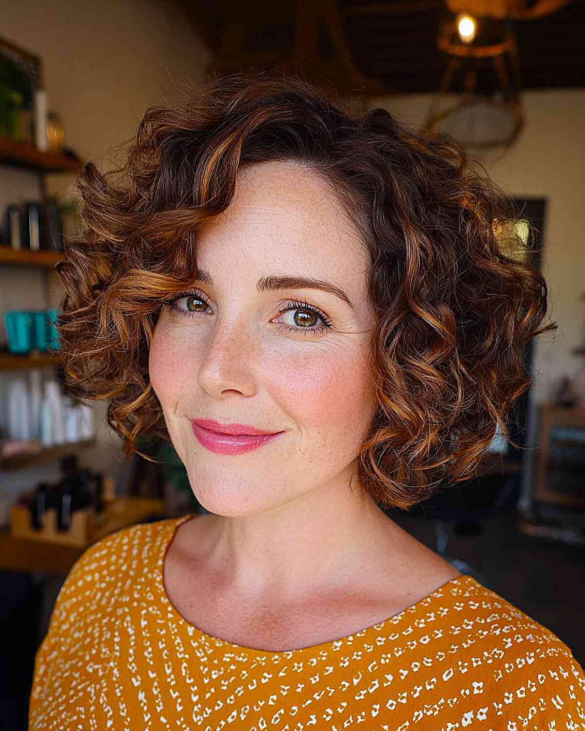 Chic Curly Bob with Subtle Highlights