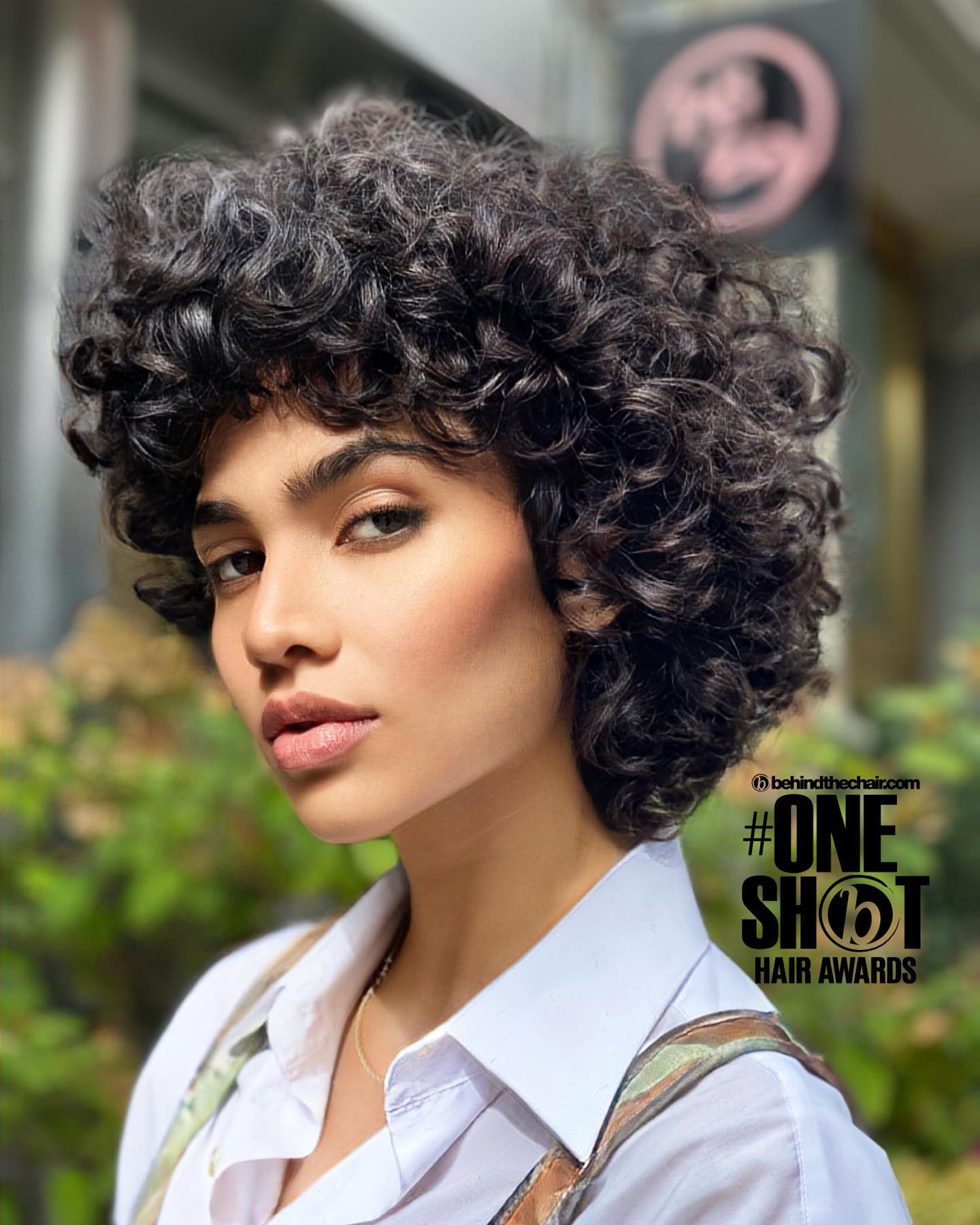 Luxurious Ebony Soft Curls with Tapered Nape