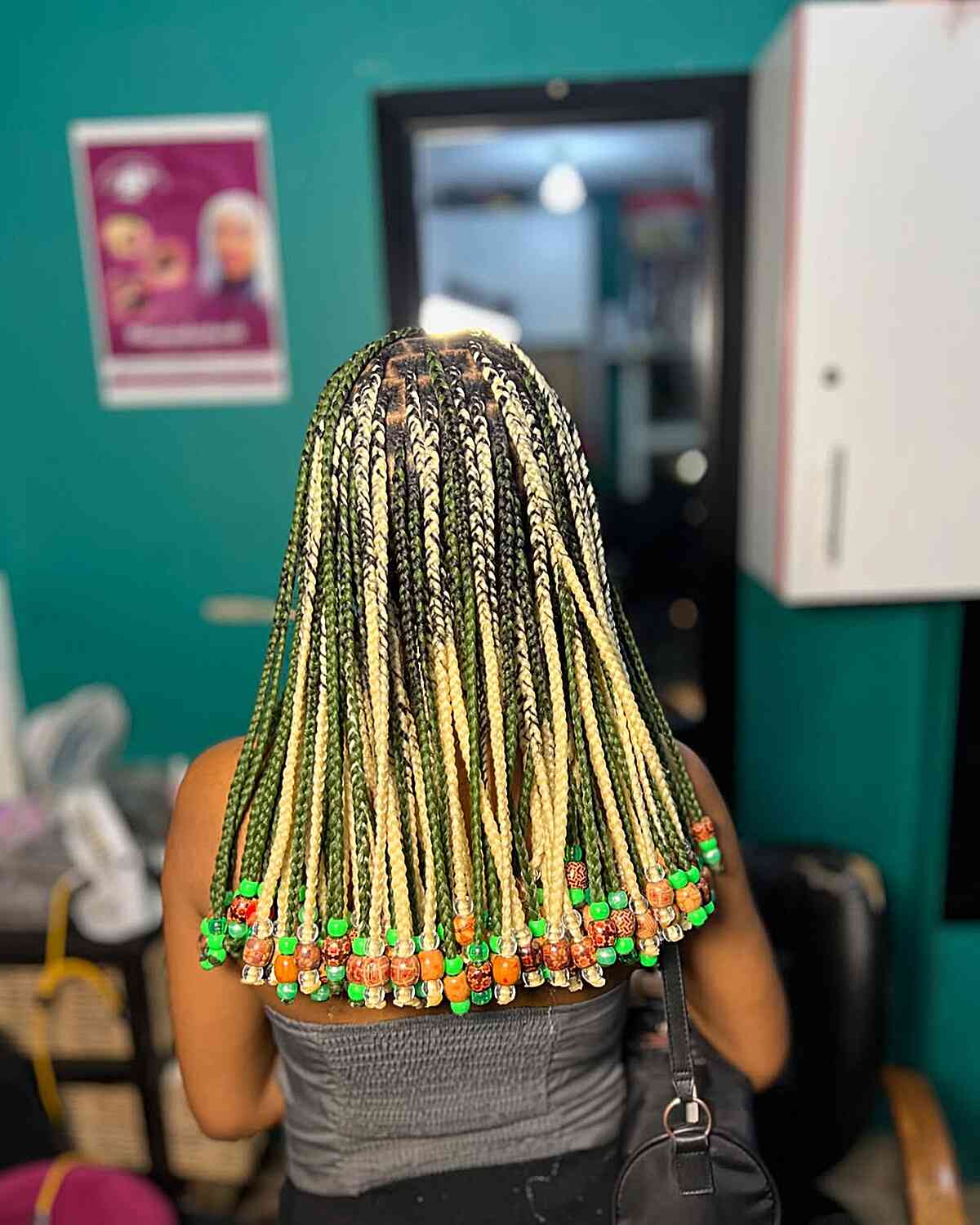 Vibrant Long Black Box Braids with Colorful Beads