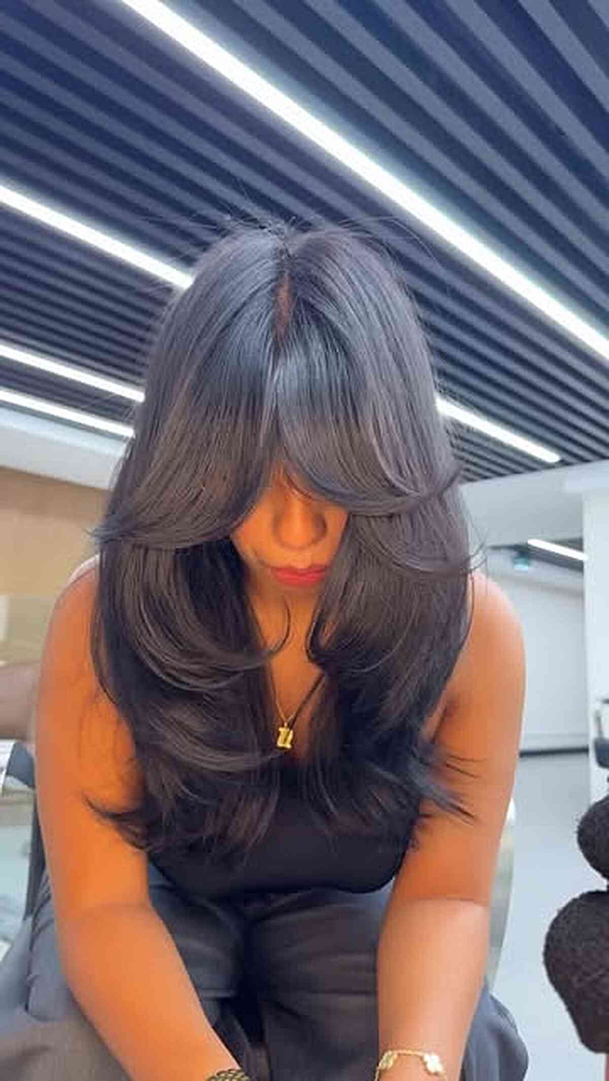 Long Layered Hair with Curtain Bangs