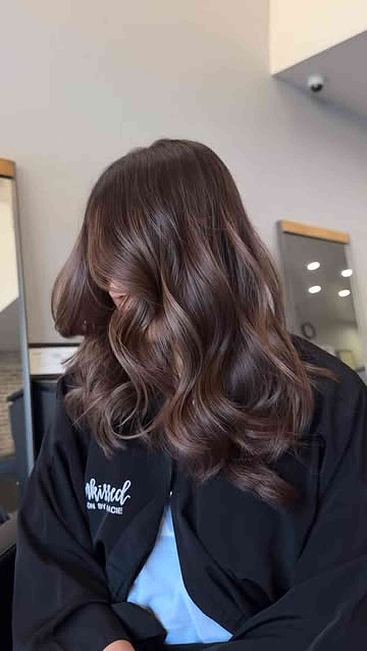 Luxurious Chocolate Brown Balayage with Waves