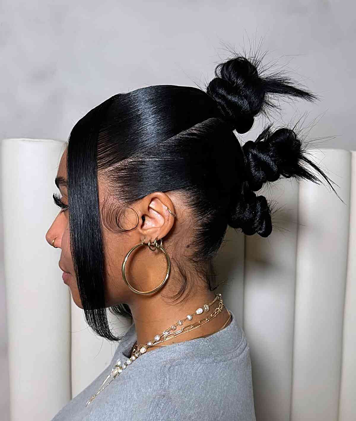 Sleek High Ponytail with Bangs