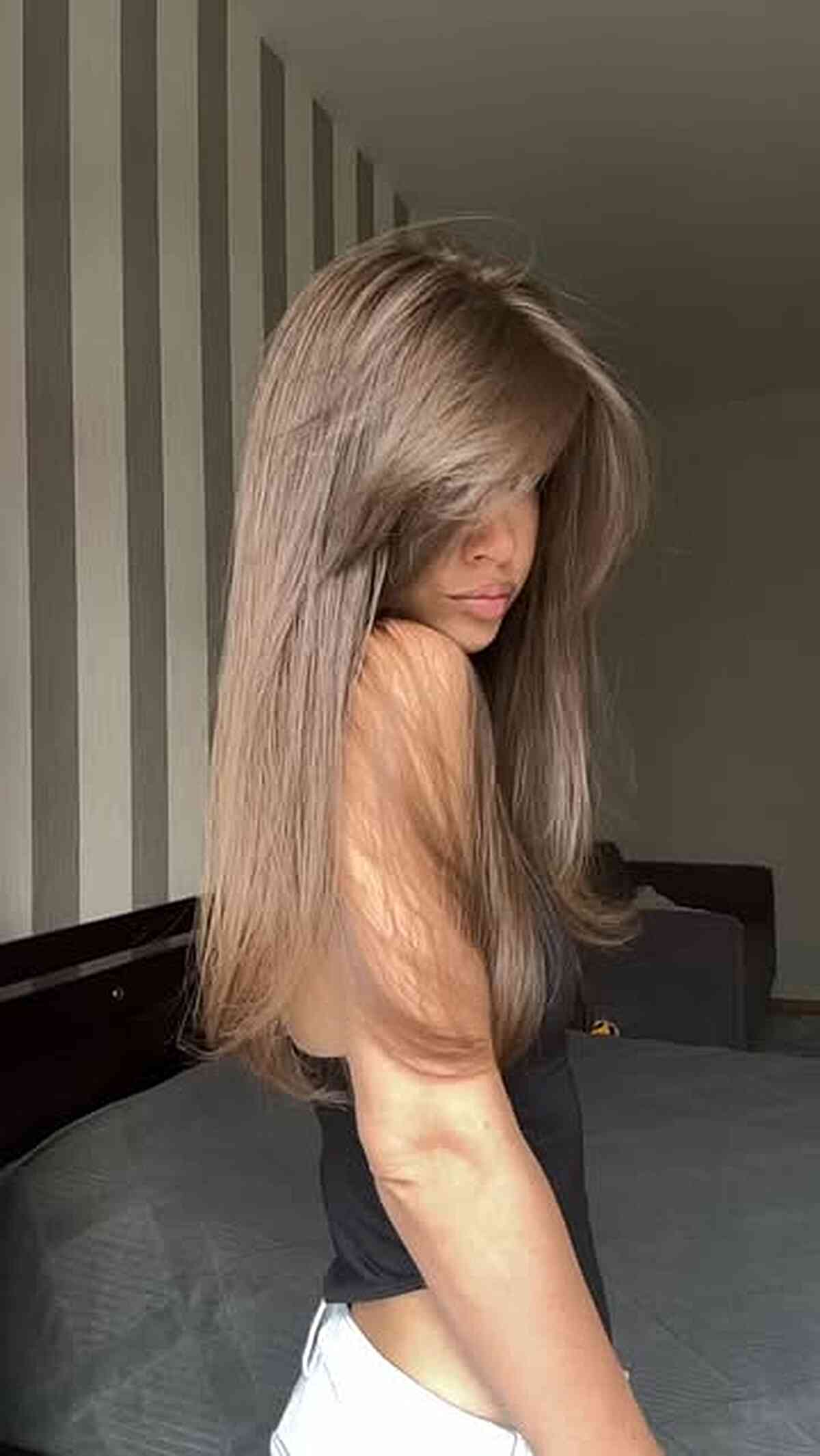 Sleek Long Straight Hairstyle with Side Bangs
