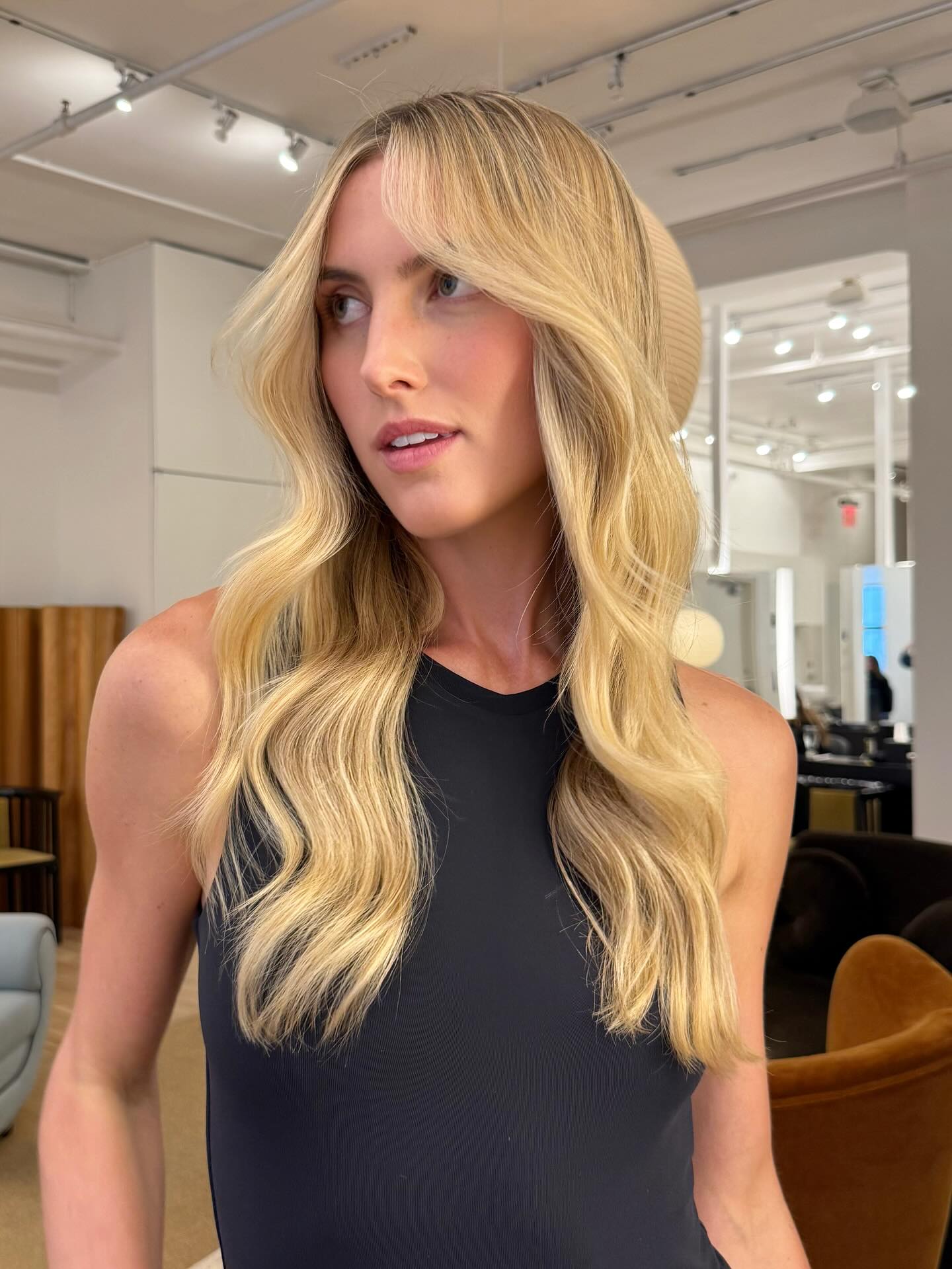 Soft Blonde Waves with Face-Framing Highlights