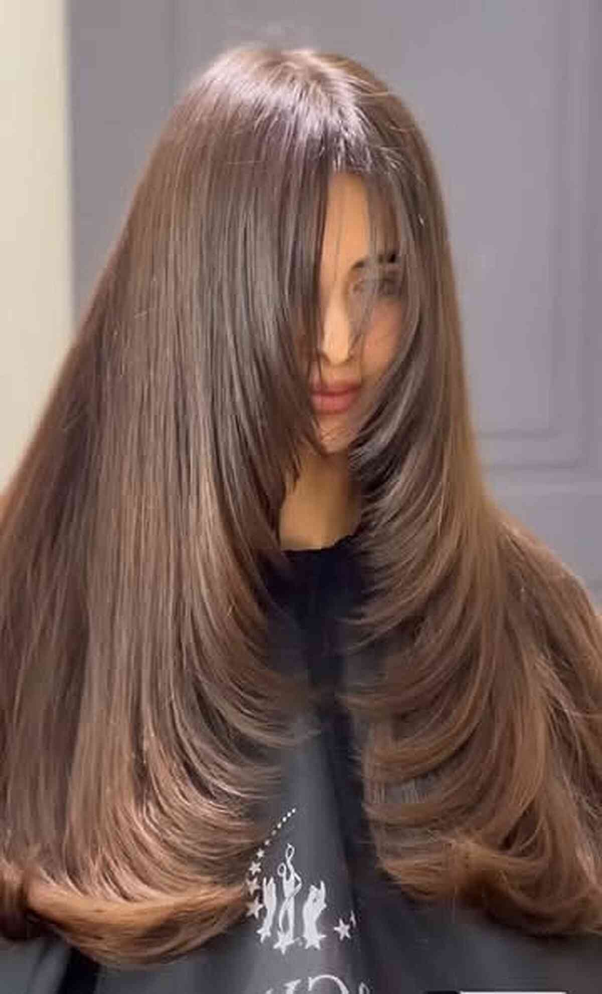 Long Face-Framing Layers with Smooth Brown Finish