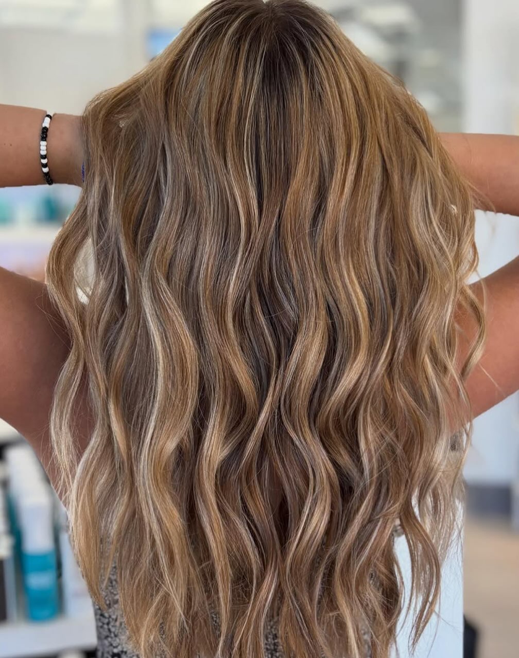 Luxurious Balayage Waves with Subtle Mid-tone Twists