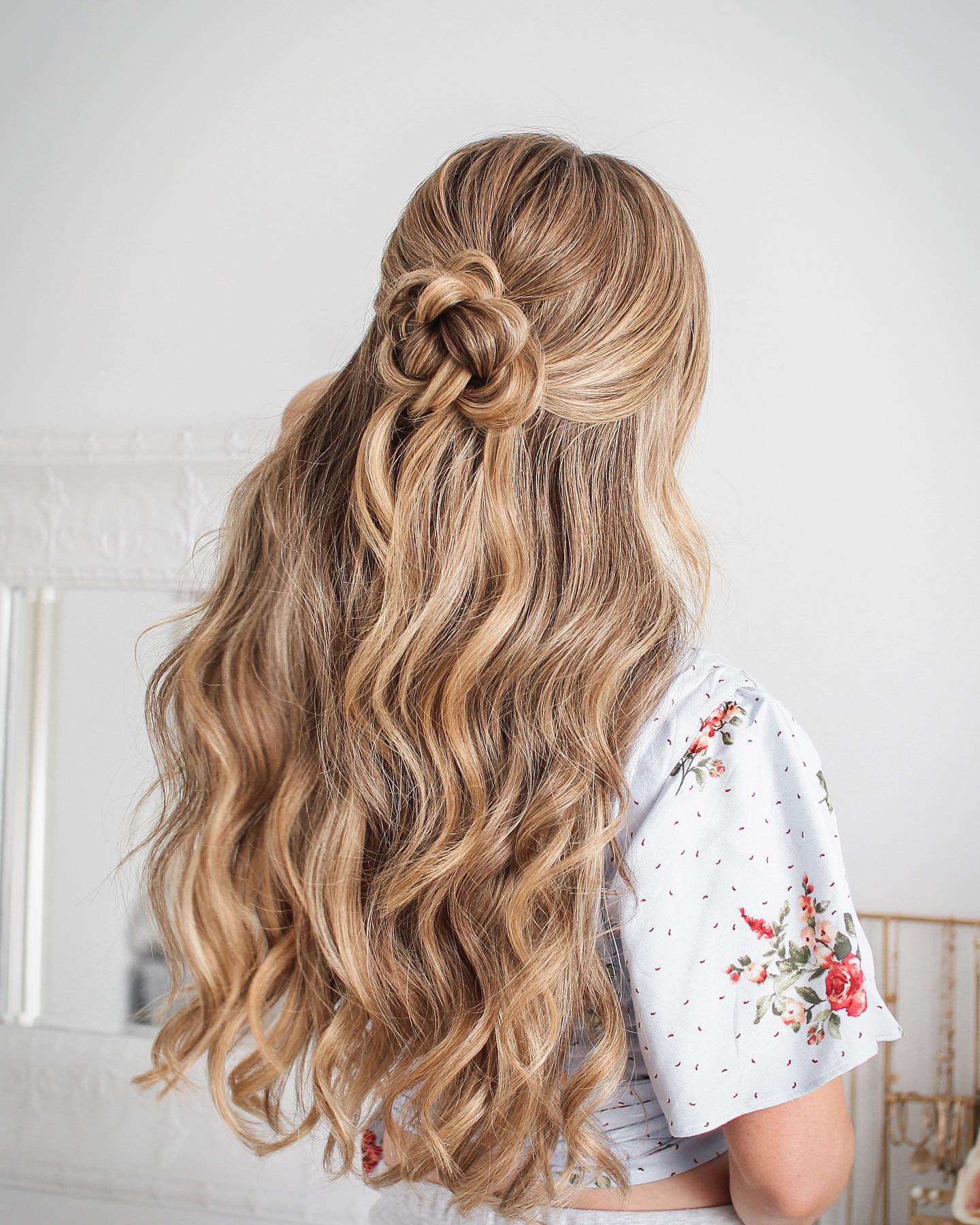 Romantic Rose-Bun Half-Up Hairstyle