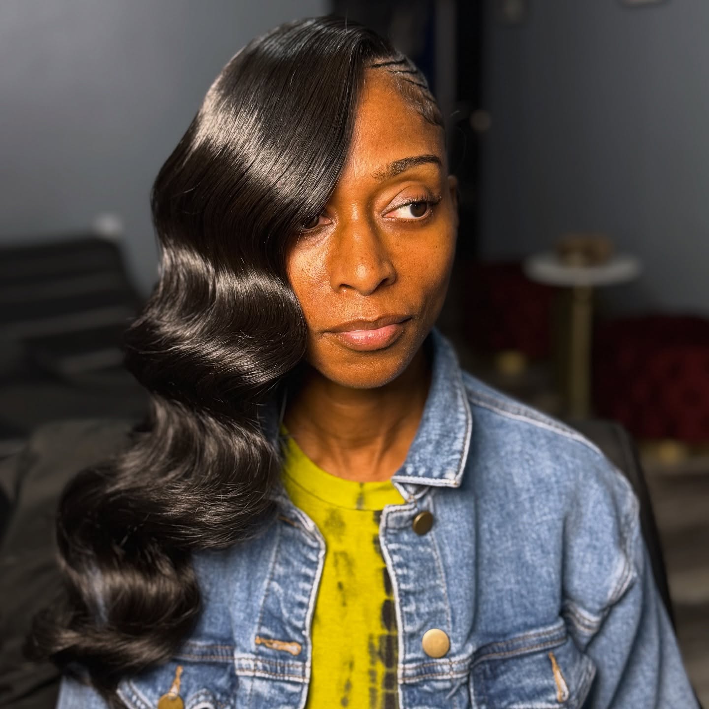 Sleek Side-Parted Waves with a Glossy Finish