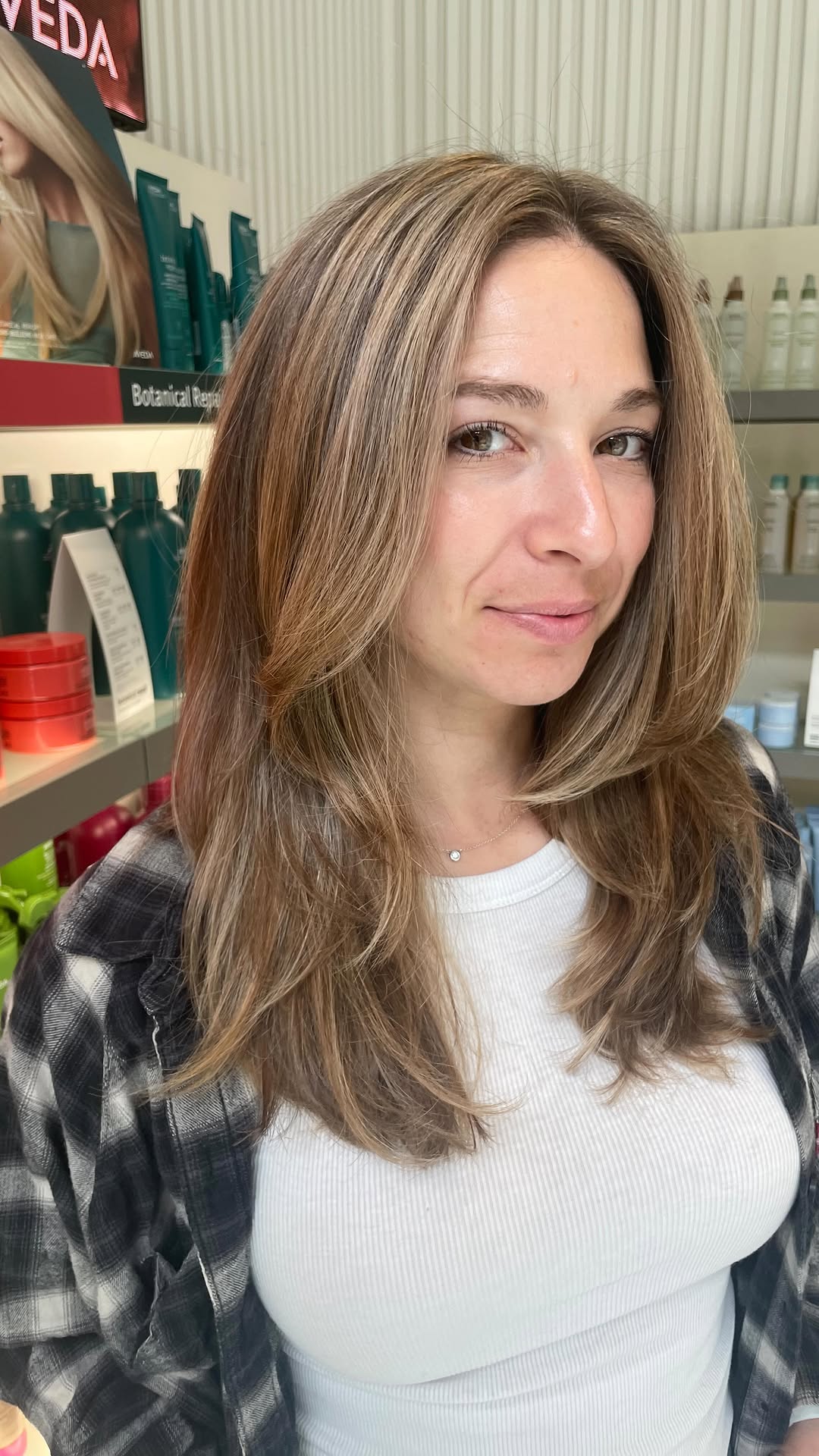 Soft Ash Blonde Layered Cut with Natural Lowlights