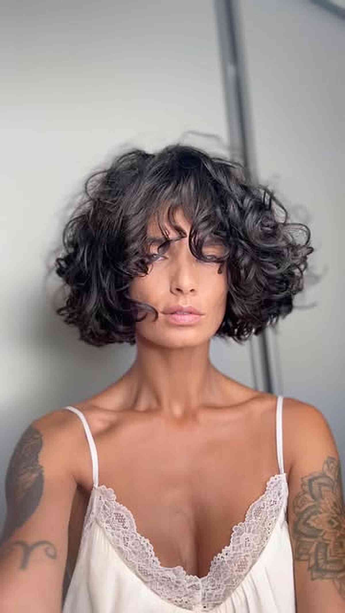 Stylish Curly Bob with Bangs