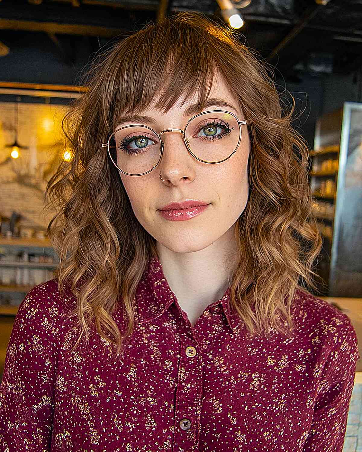 Textured Shoulder-Length Curly Cut with Bangs