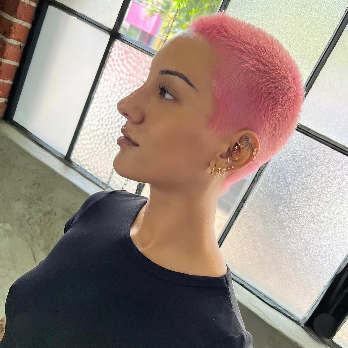 Bold Pink Buzz Cut for a Striking Statement