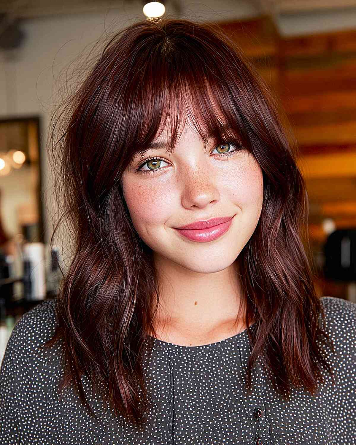 Effortlessly Chic Wispy Bangs with Soft Layers
