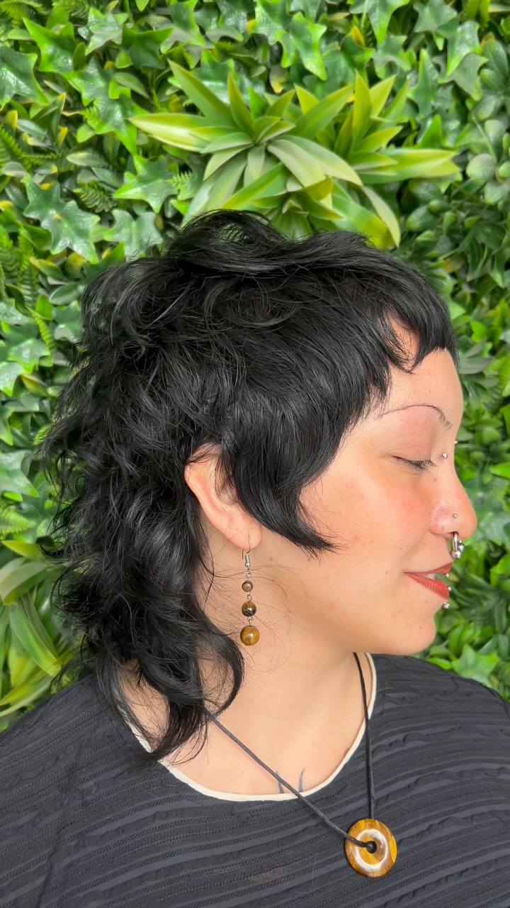 Playful Black Bob with Tousled Waves