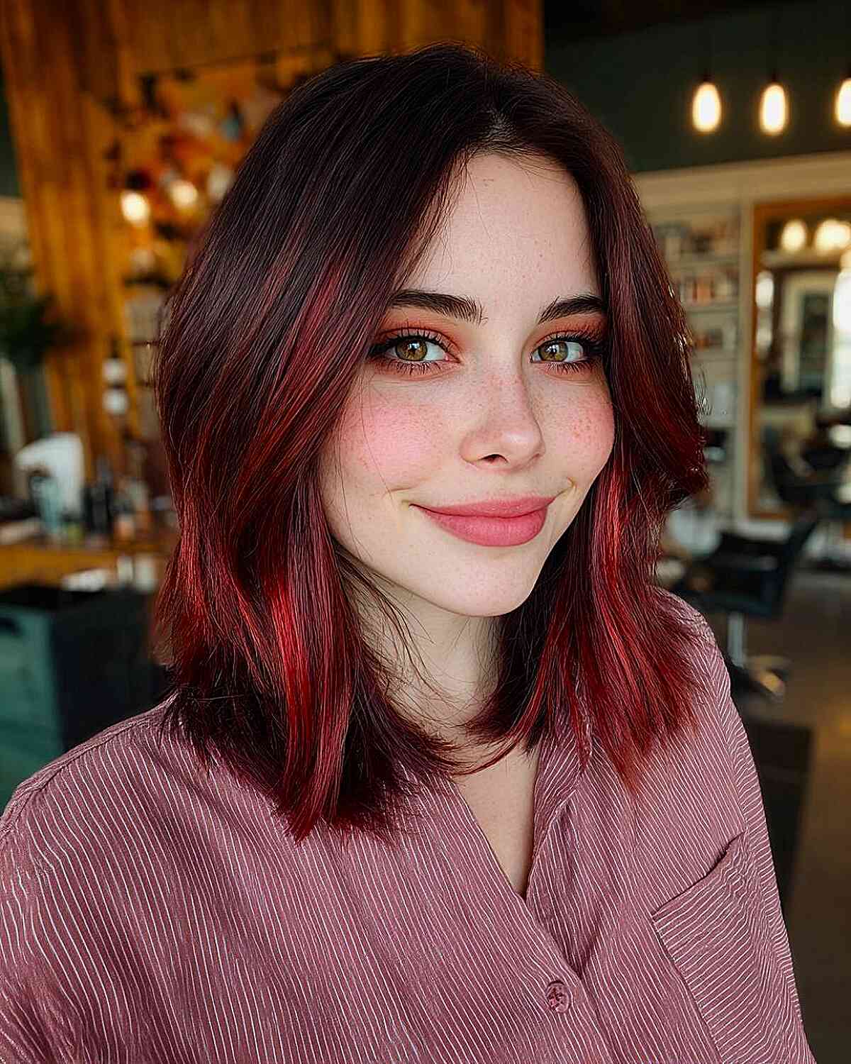 Trendy Black Bob with Bold Red Highlights
