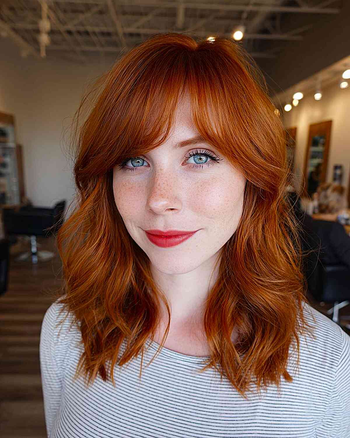 Vibrant Copper Waves with Face-Framing Bangs