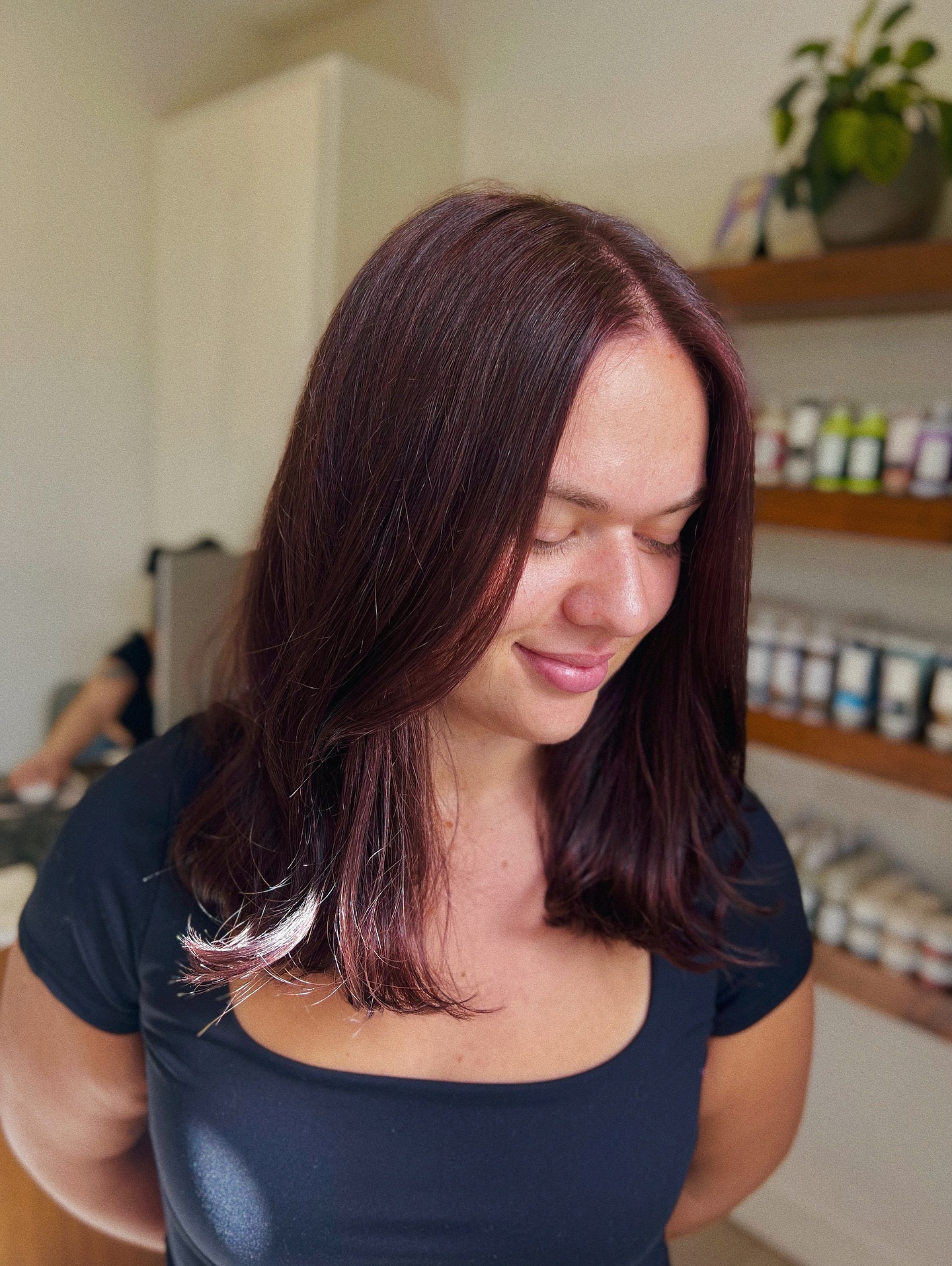 Burgundy Blush Shoulder-Length Cut with Feathered Ends