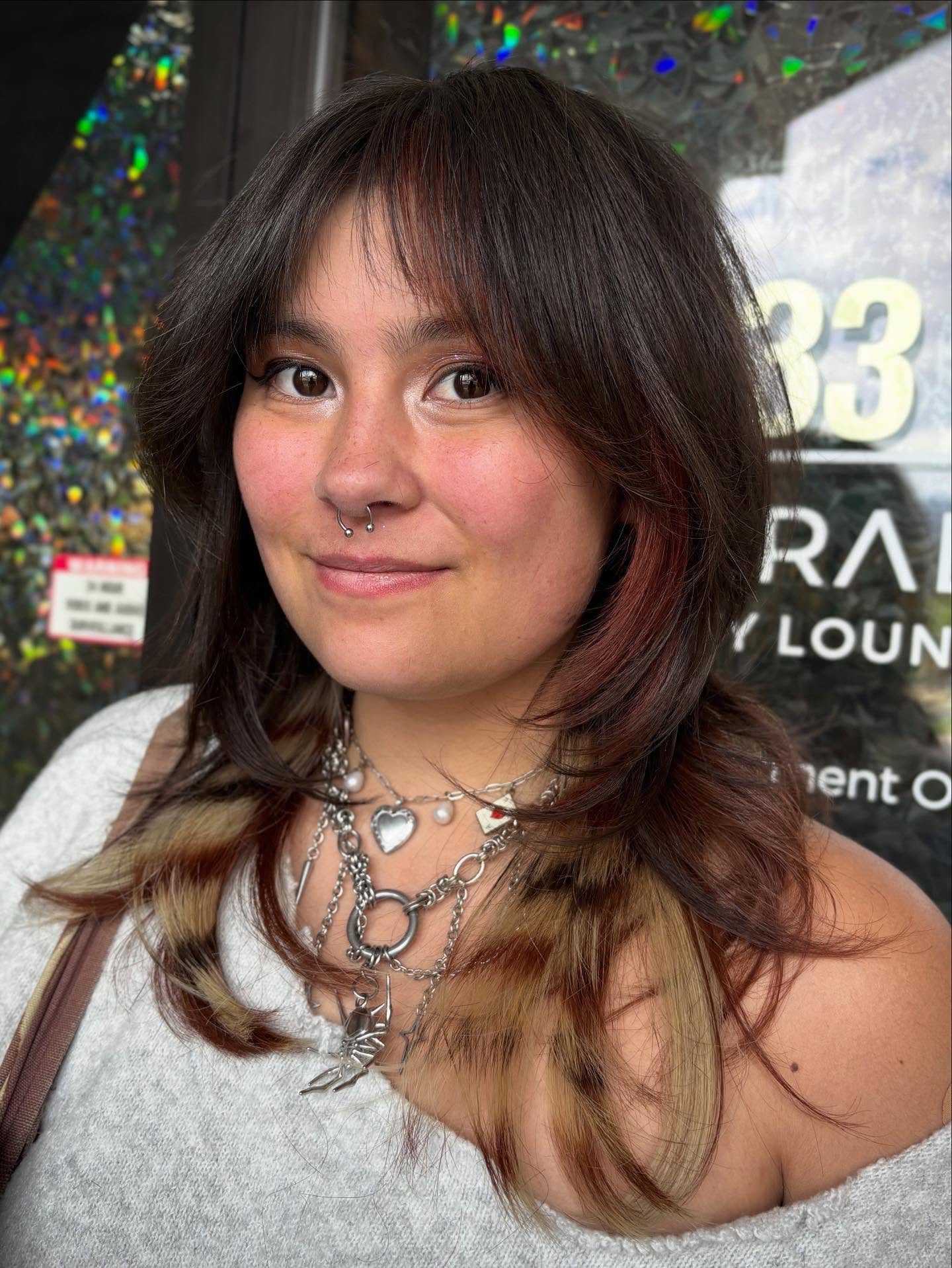 Dynamic Chestnut Balayage with Bold Face-Framing Highlights