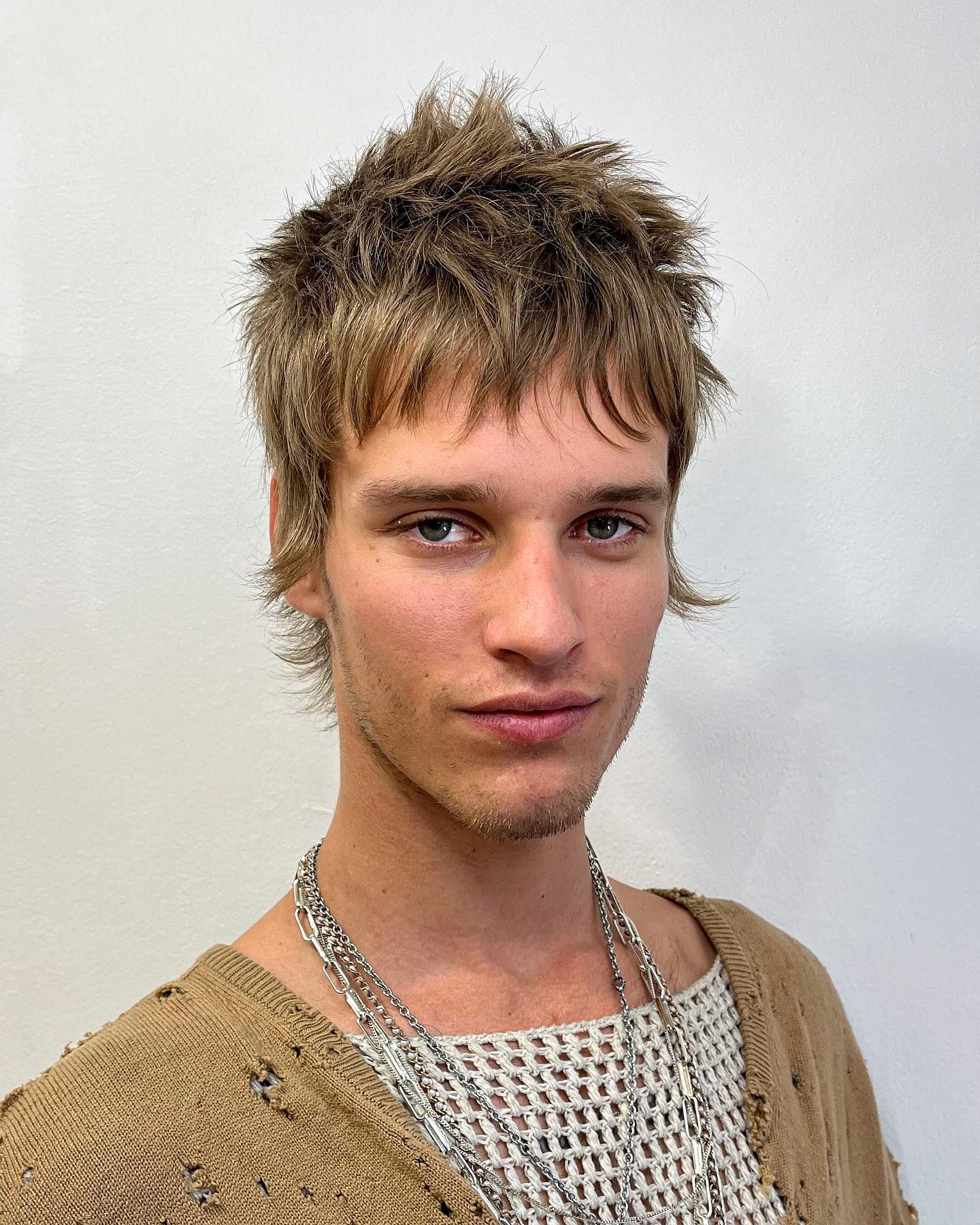 Edgy Textured Fringe with Sun-Kissed Highlights