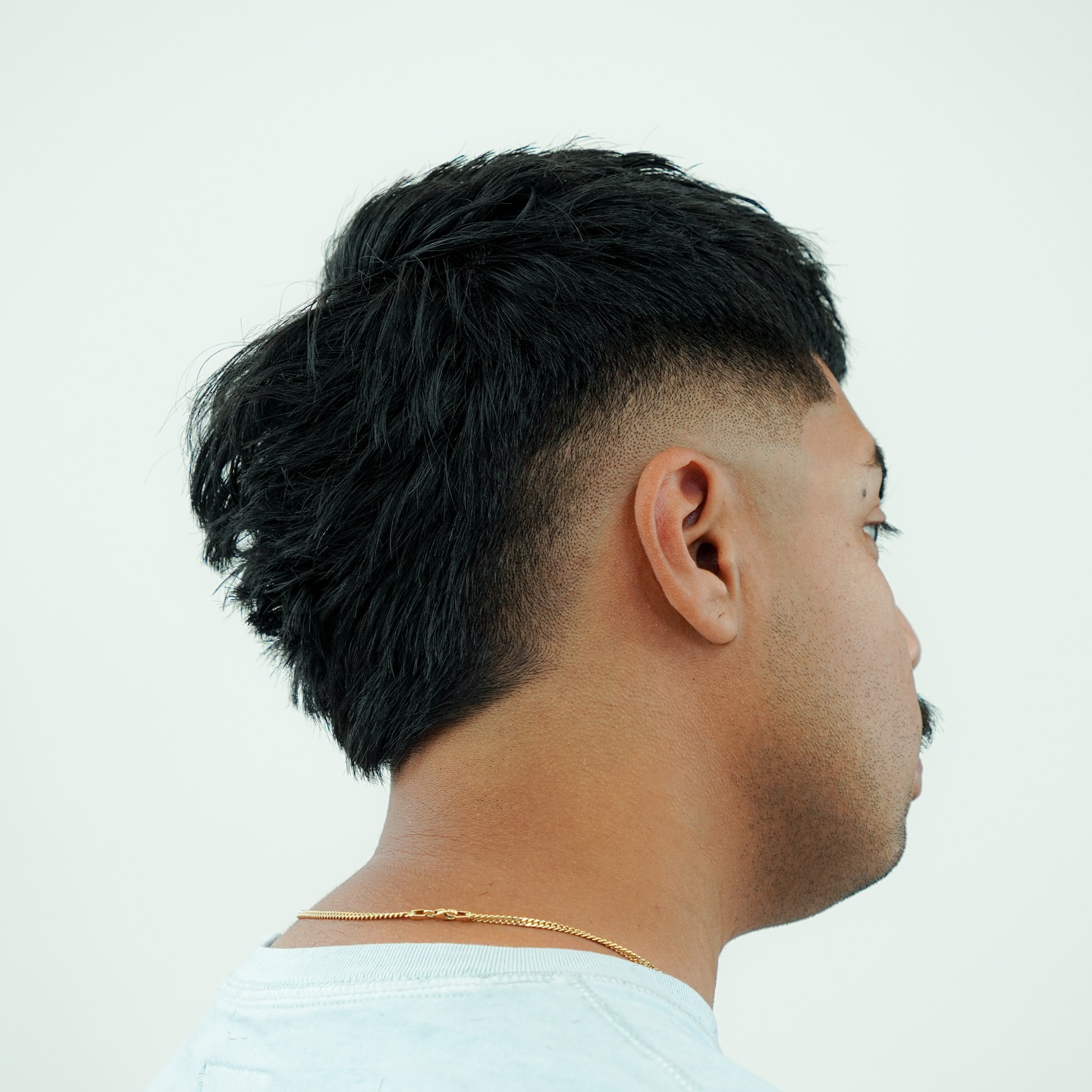 Edgy Tousled Top with Sharp Fade