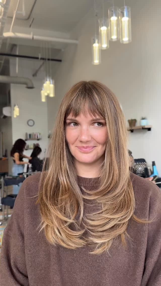 Effortless Layered Feather Cut with Face-Framing Fringe