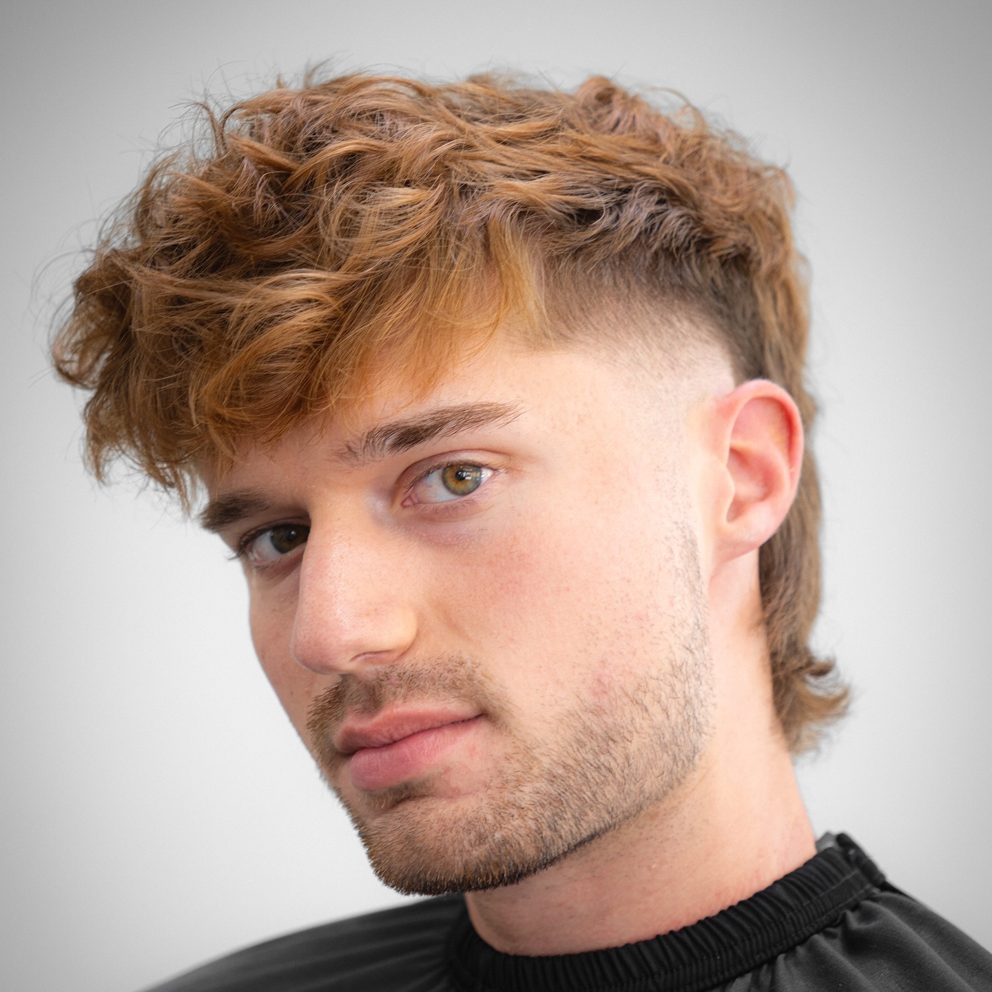 Effortlessly Chic Wavy Fringe with Soft Taper