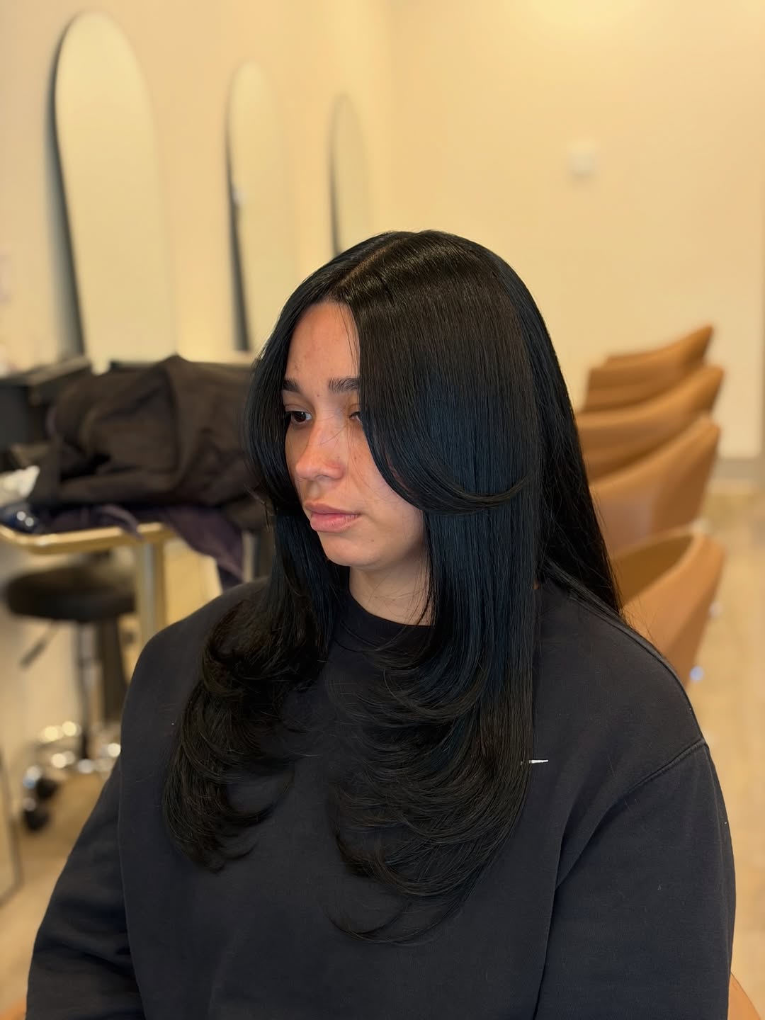 Elegant Midnight Black Long Layers with Soft Curls