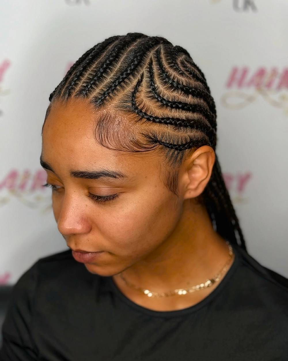 Intricate Spiral Cornrows with Defined Edges