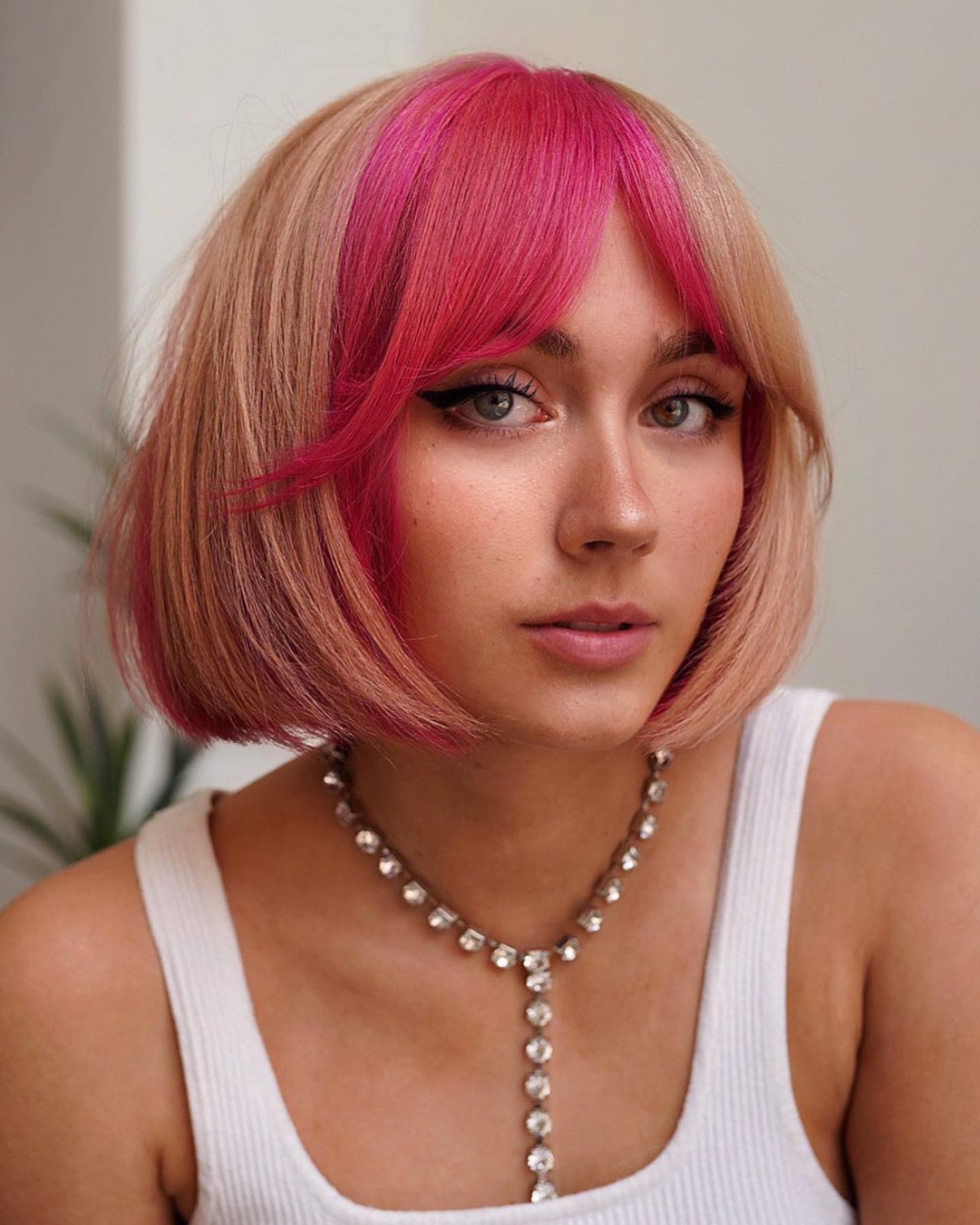Pink-Tinged Blush Bob with Feathered Bangs