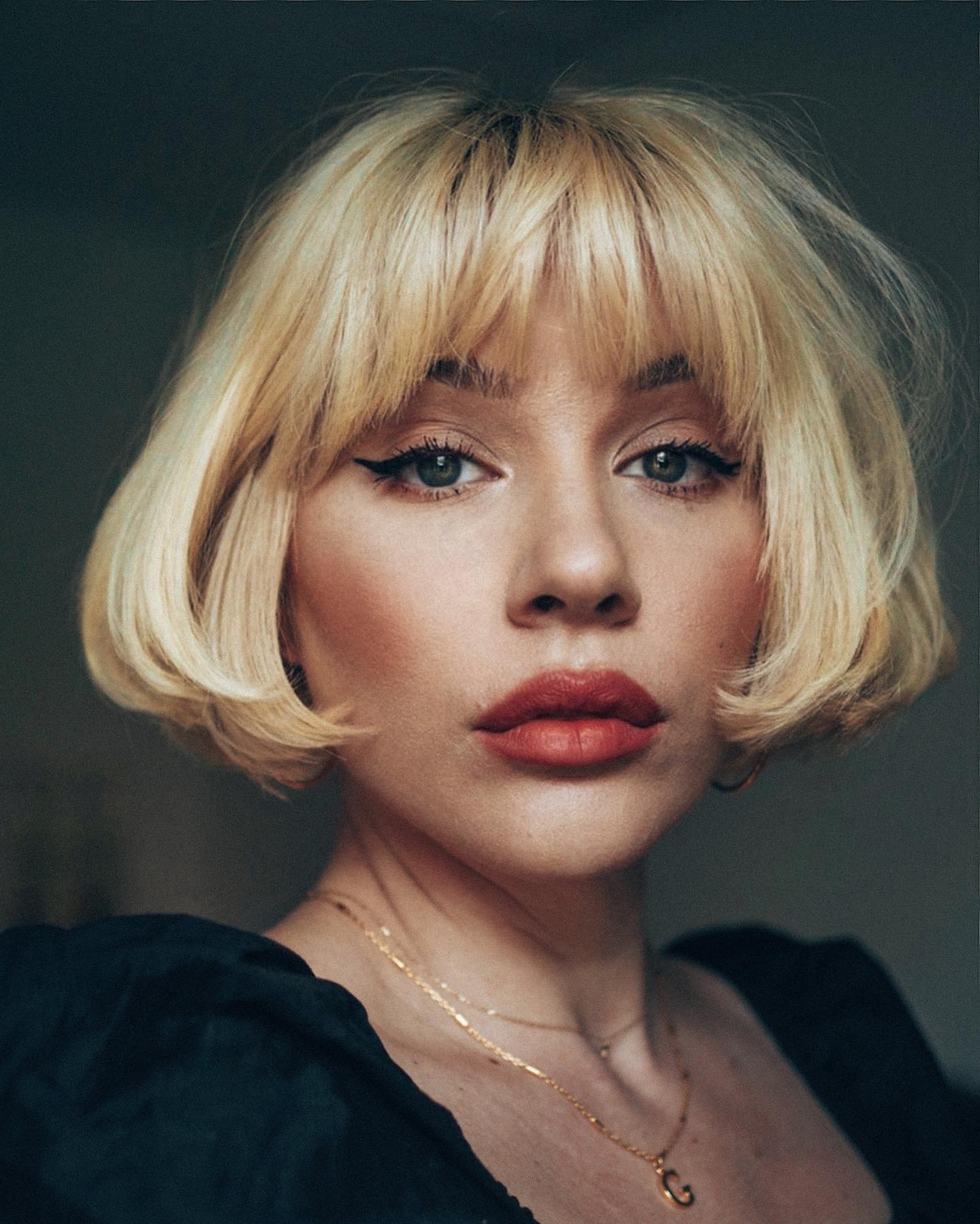 Platinum Blonde Bob with Curtain Bangs