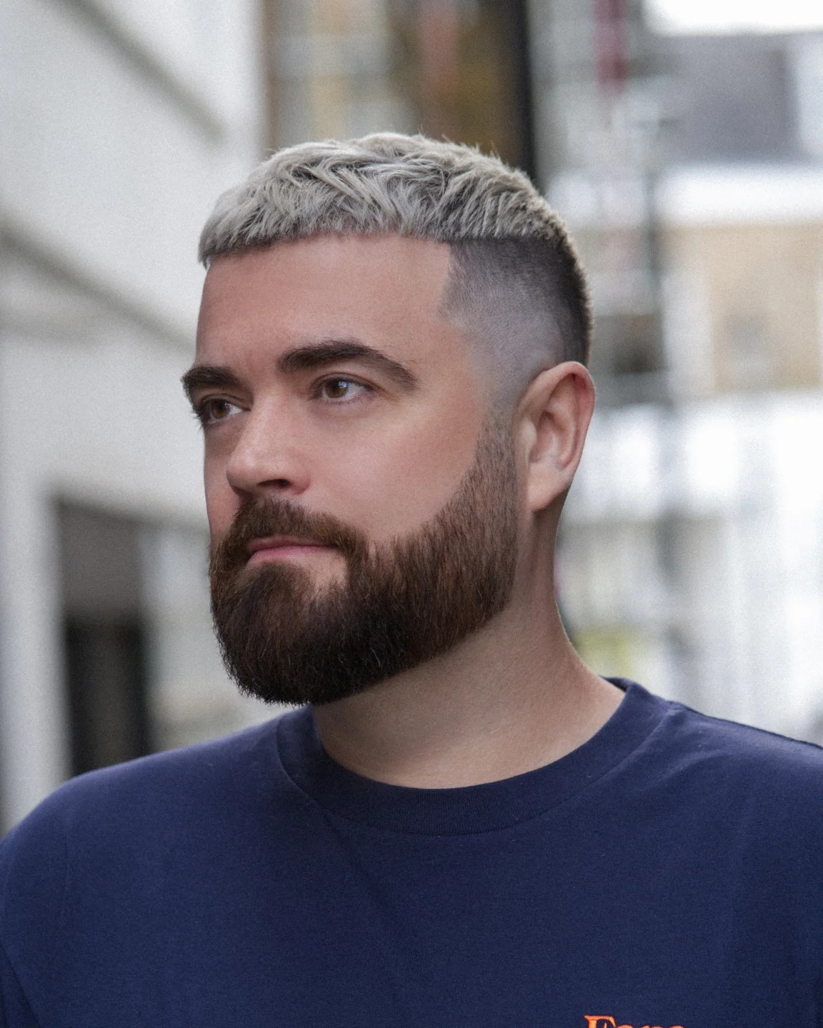 Platinum Silver Crop with Sharp Fade and Beard Blend