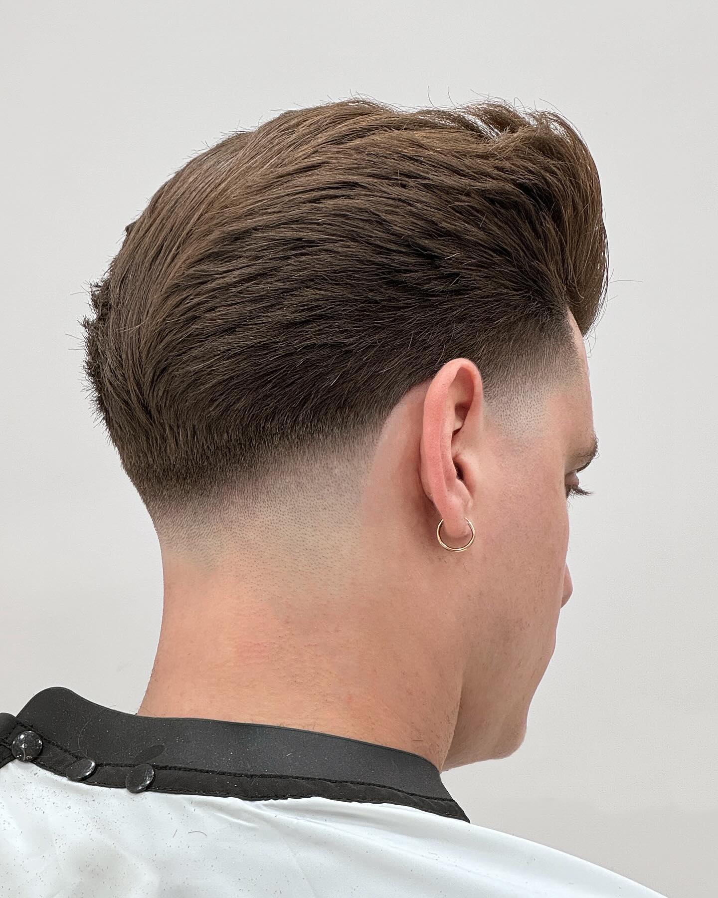 Polished Undercut with Voluminous Brushed-Back Top