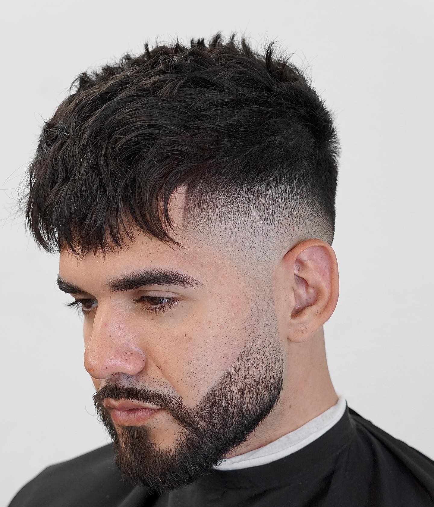 Rugged Deep-Parted Fringe with Precision Fade