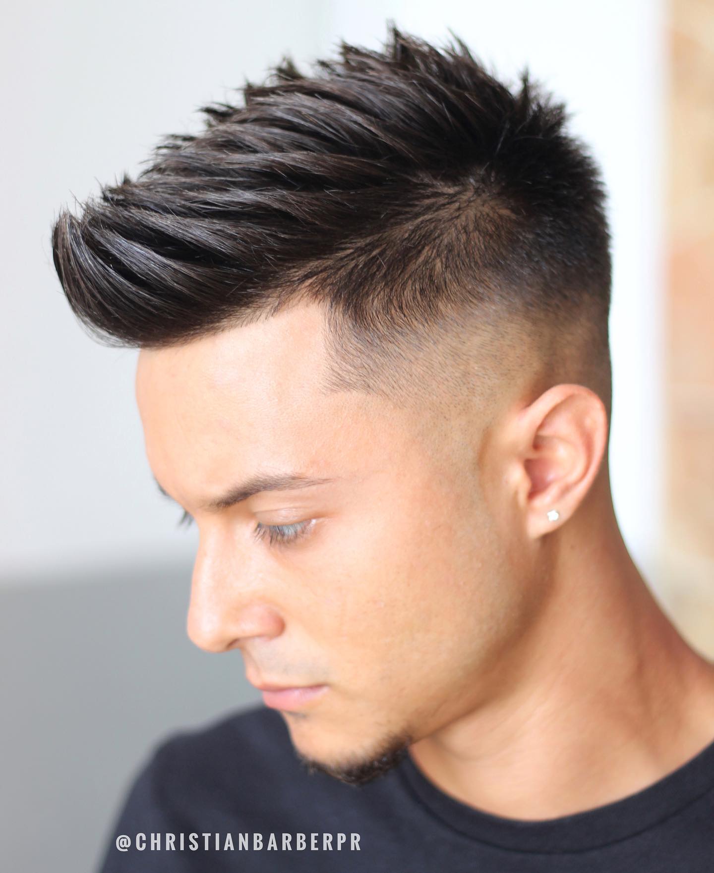 Sculpted Voluminous Quiff with Razor-Shaved Sides