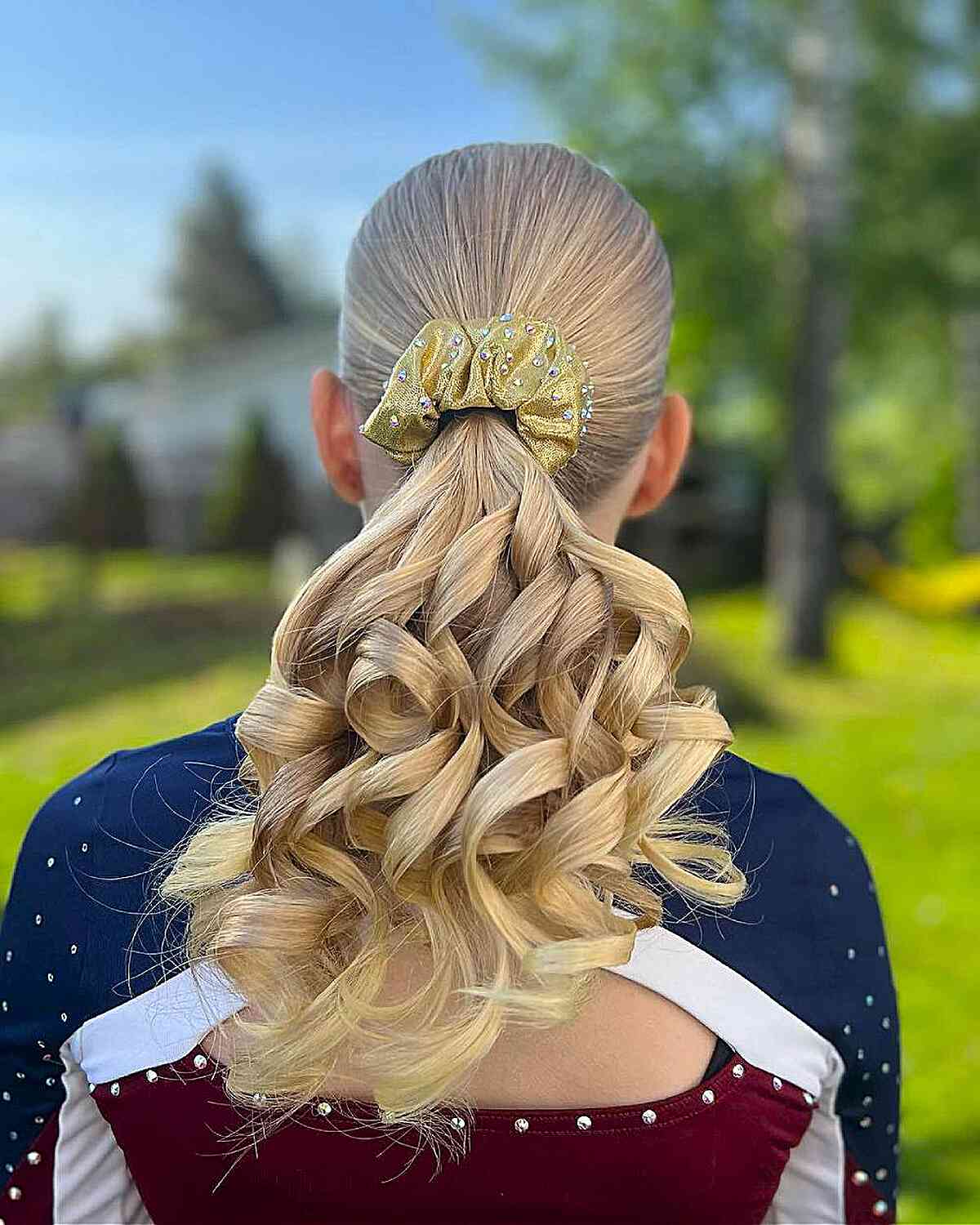 Stylish Cheerleading Ponytail with Cascading Curls