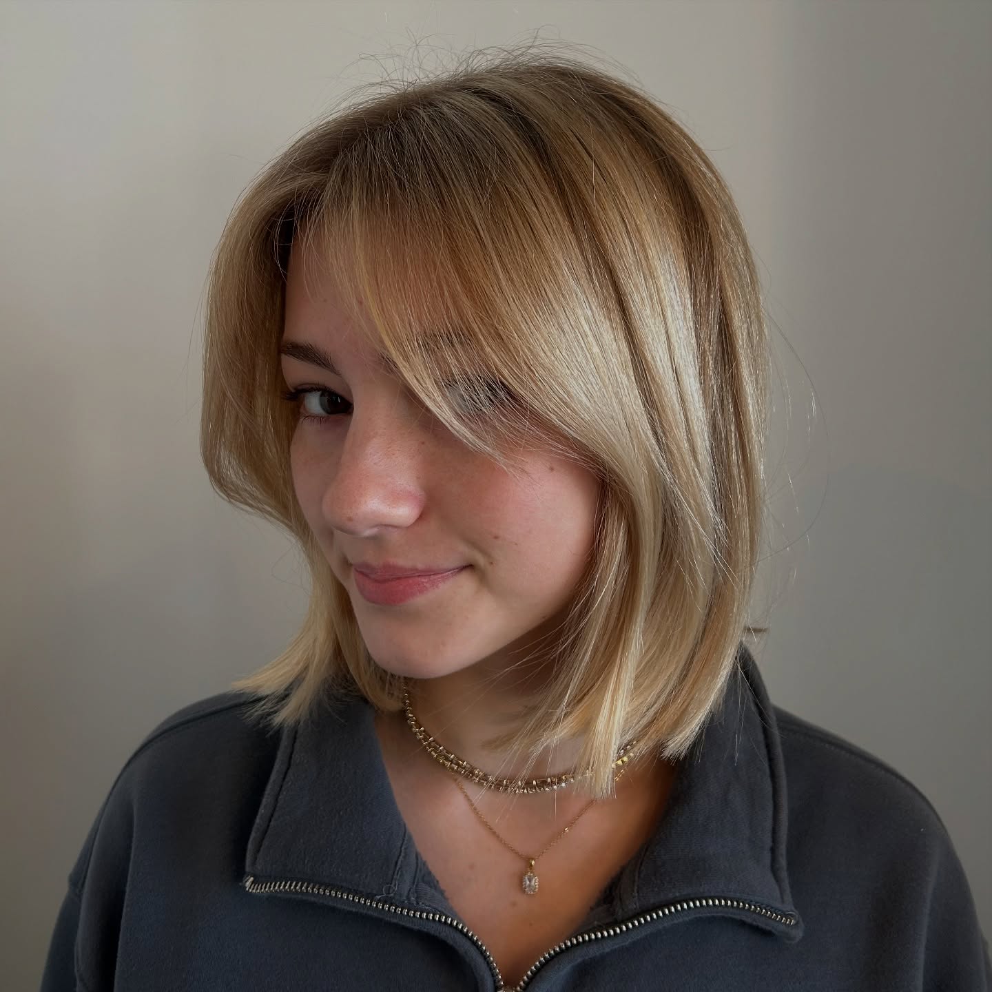 Sun-Kissed Blonde Textured Bob with Wispy Ends