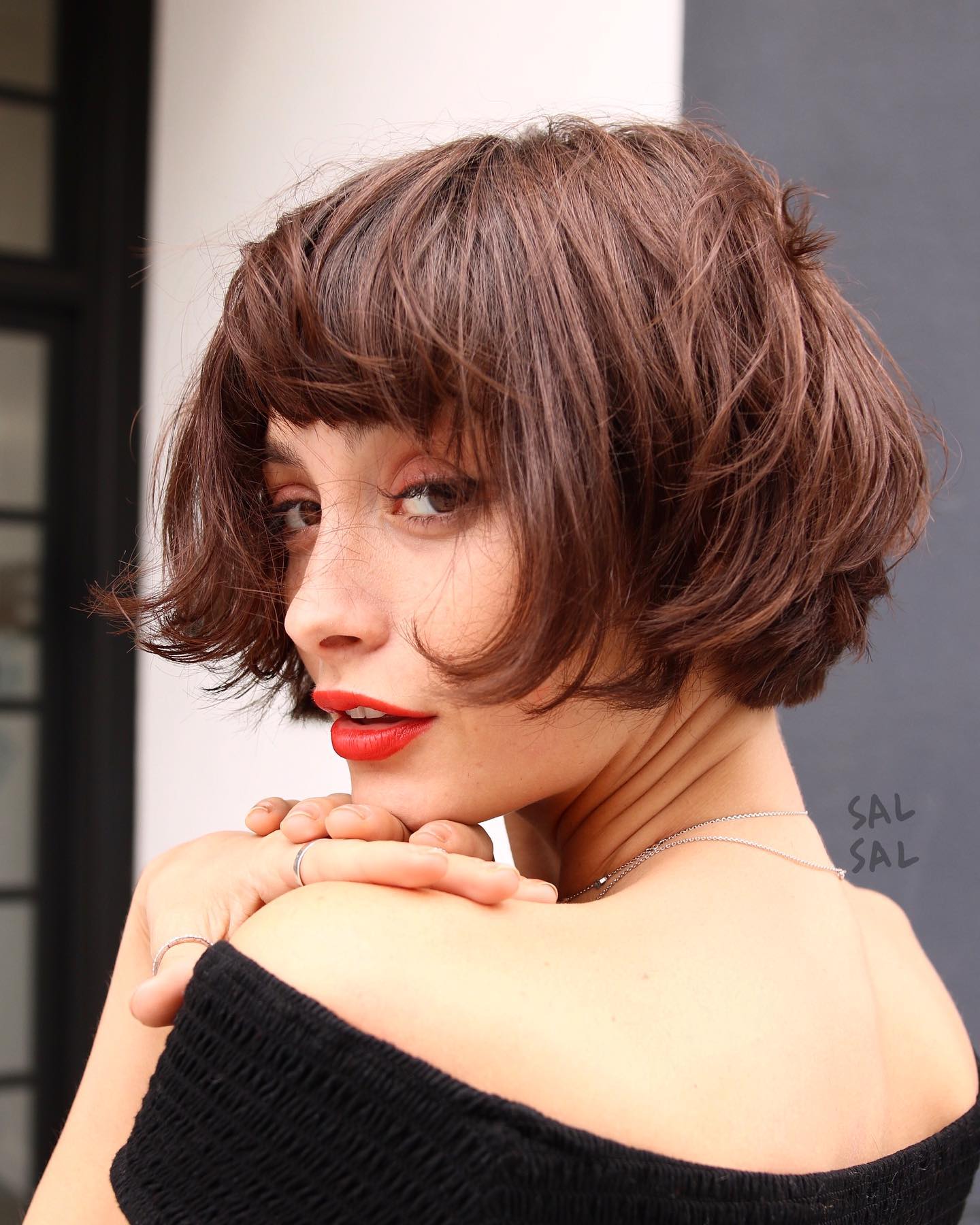 Textured Chestnut Bob with Voluminous Bangs