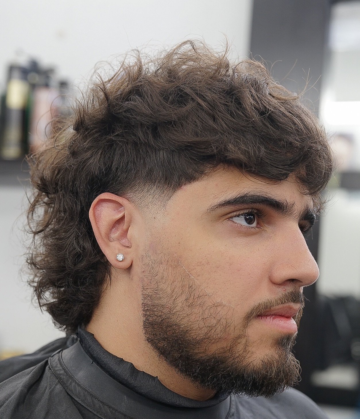 Textured Curly Top with Tapered Sides