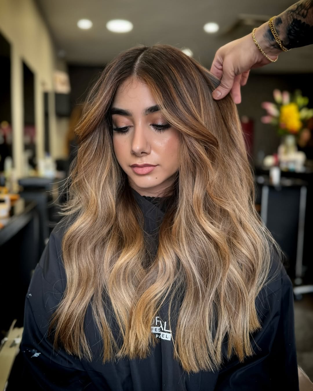 Warm Balayage Waves with Face-Framing Layers