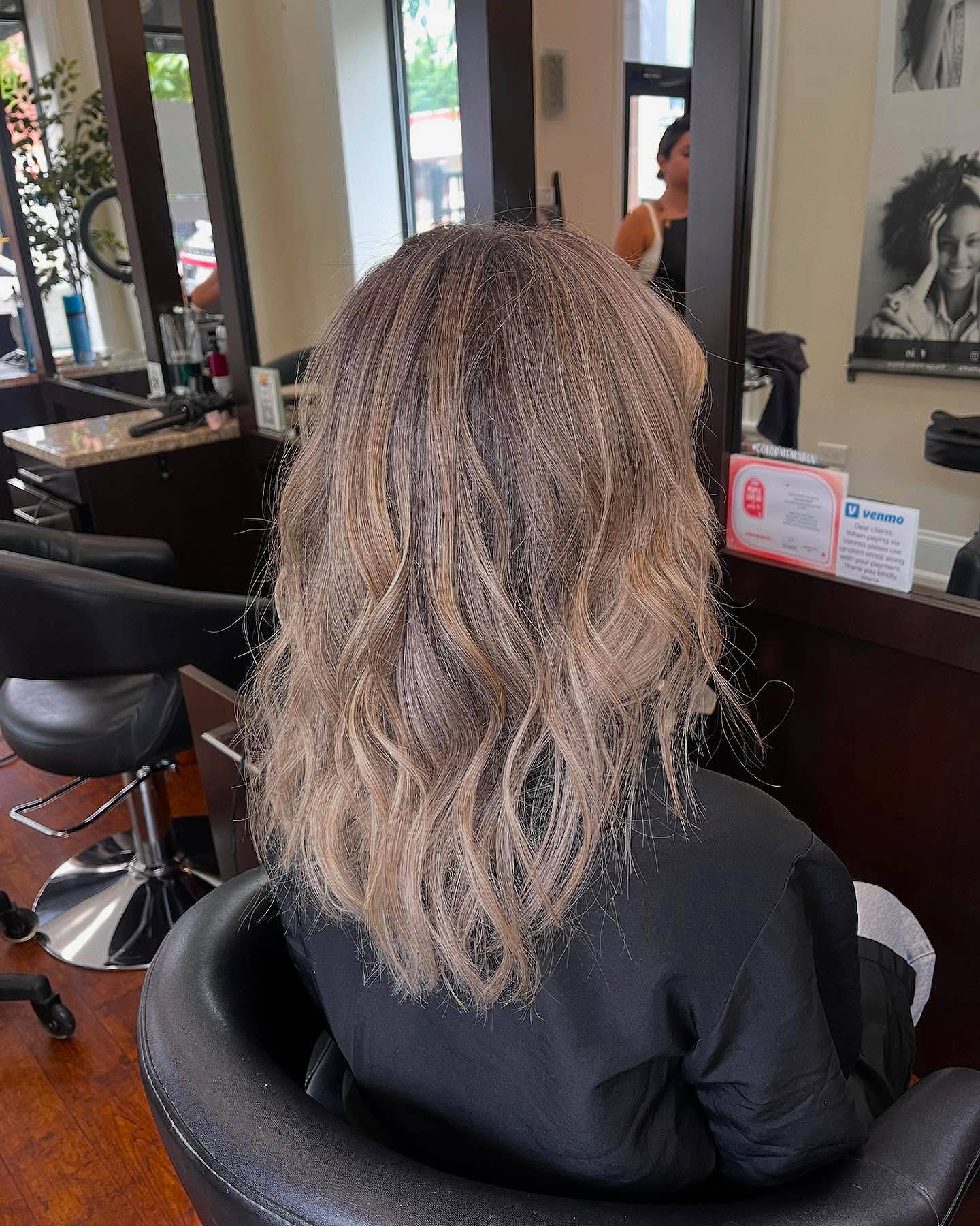 Beachy Blonde Medium Length Waves with Soft Layering