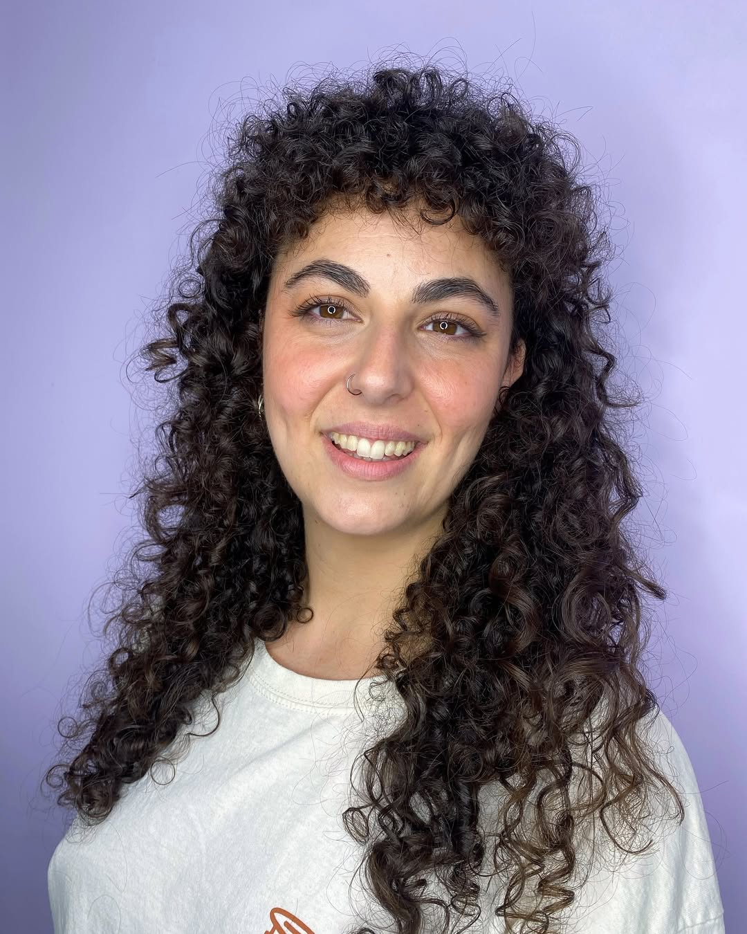 Bouncy Natural Curls with Voluminous Layering