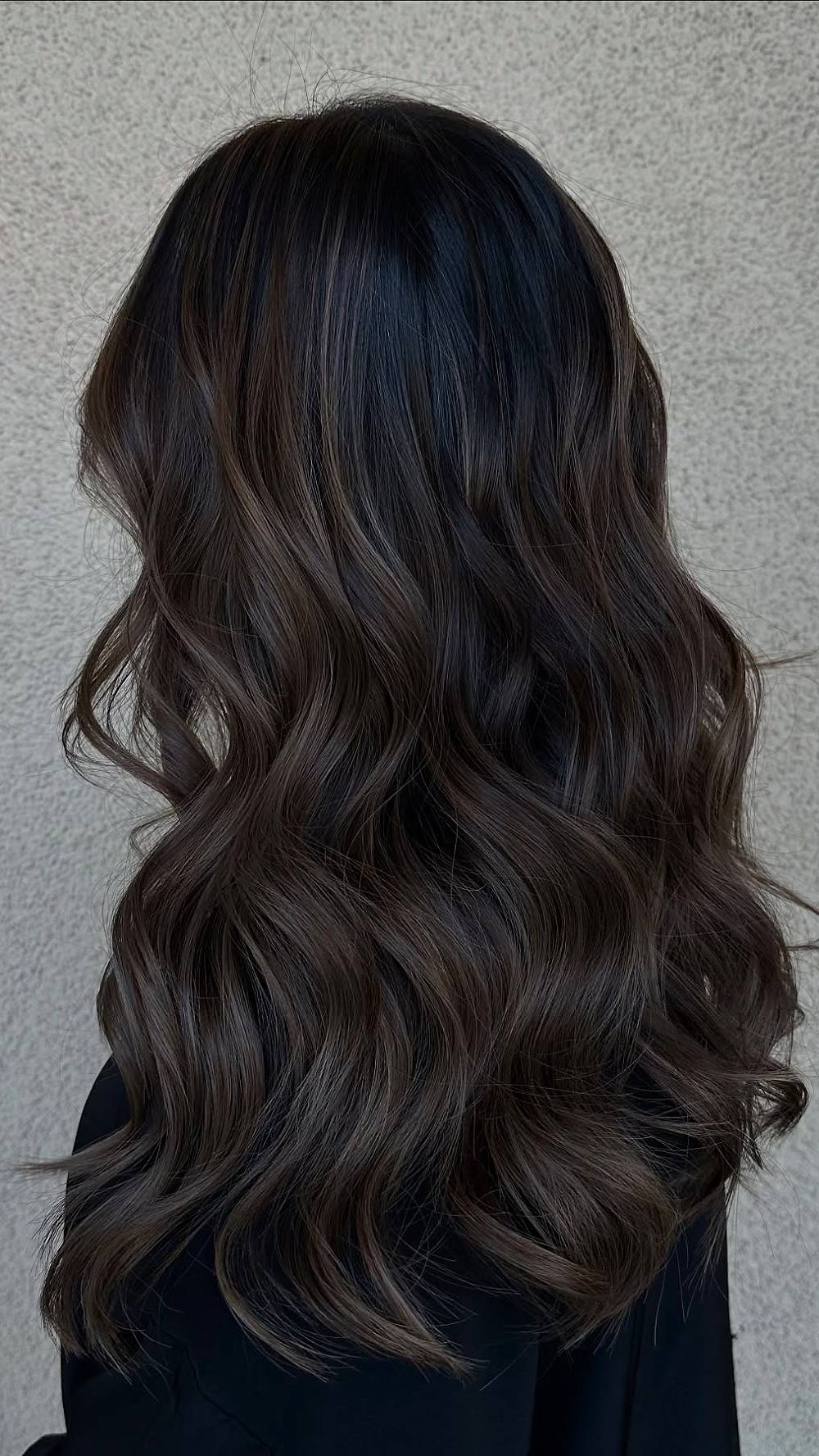 Charming Warm Brunette Waves with Subtle Highlights
