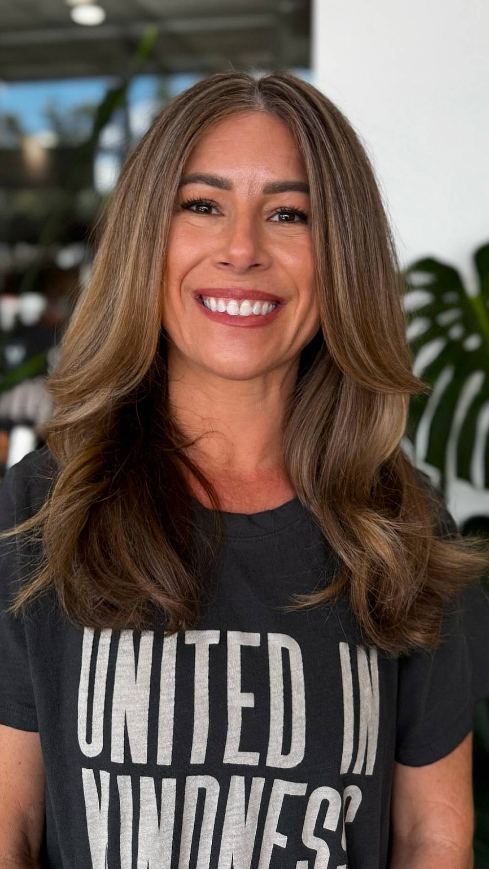 Chic Long Brunette Layers with Warm Dimension