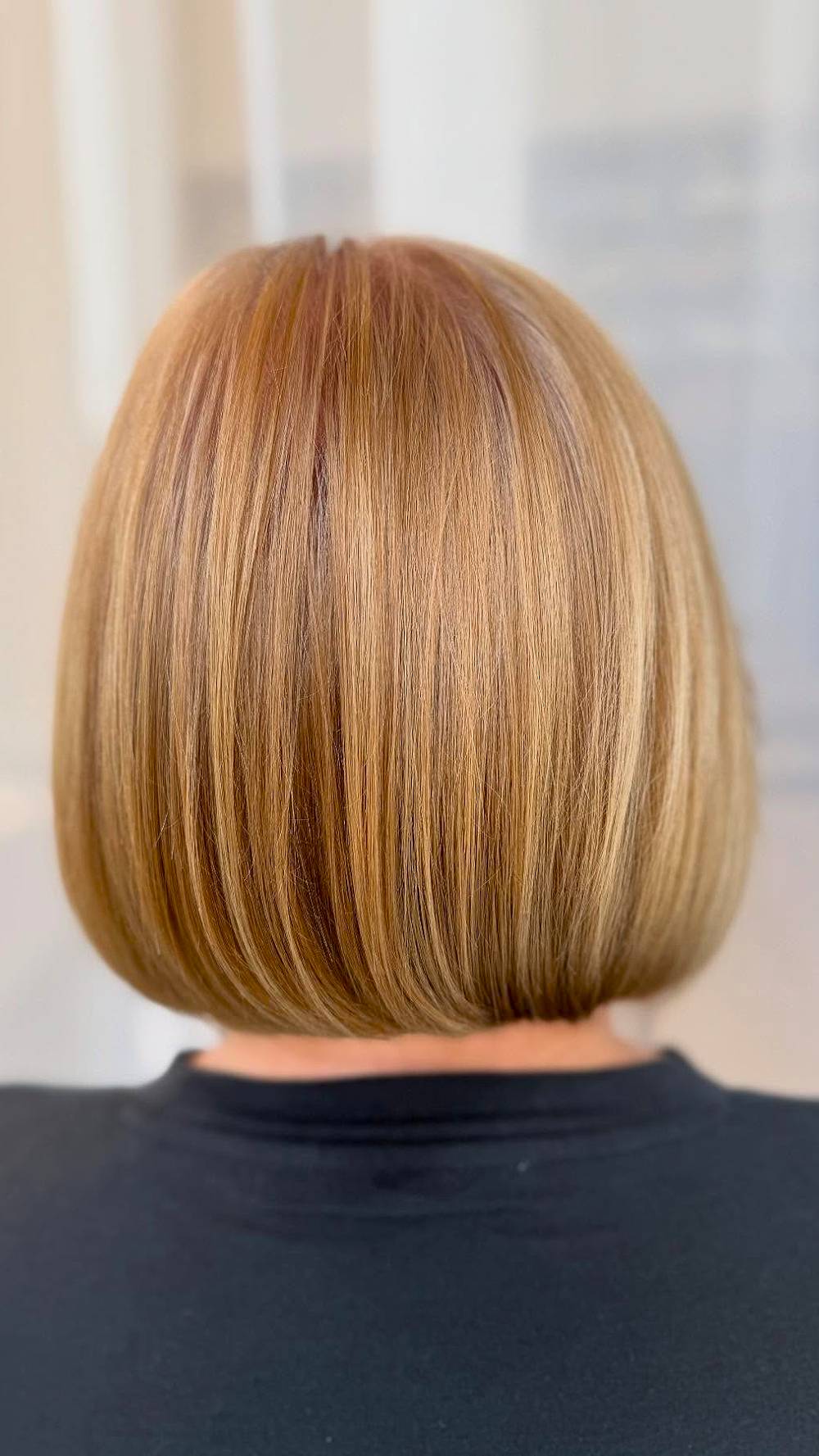 Classic Golden Blunt Bob with Subtle Highlights