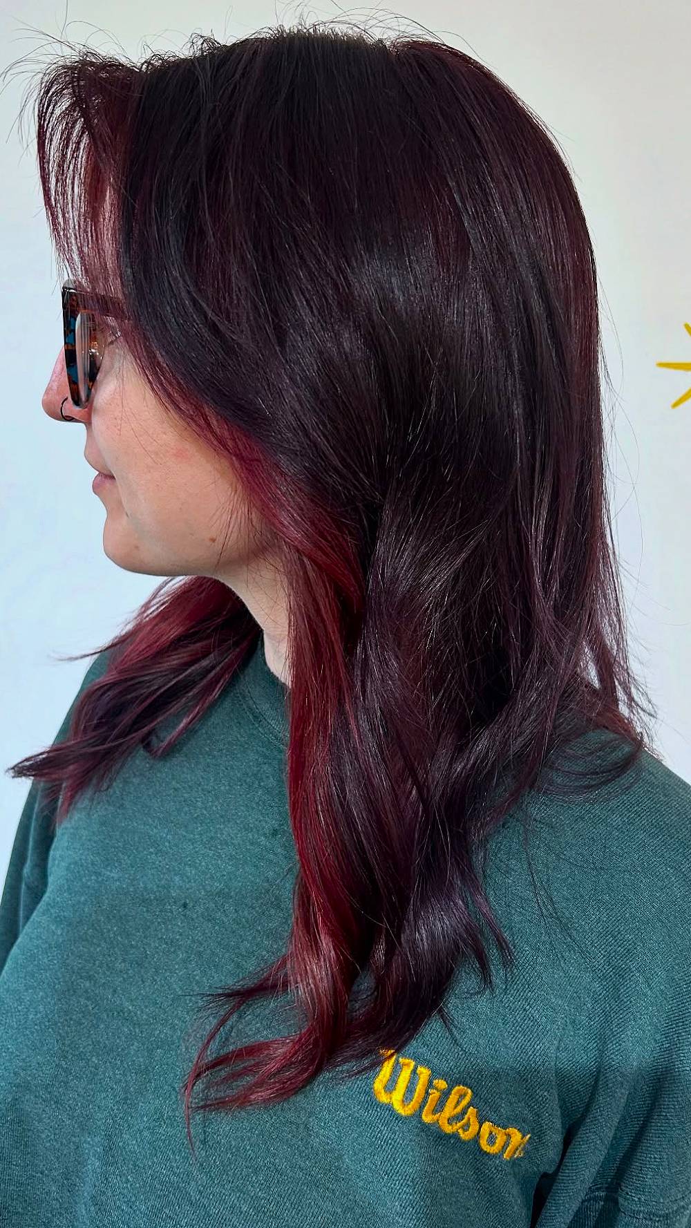 Dynamic Deep Burgundy Hair with Radiant Red Highlights