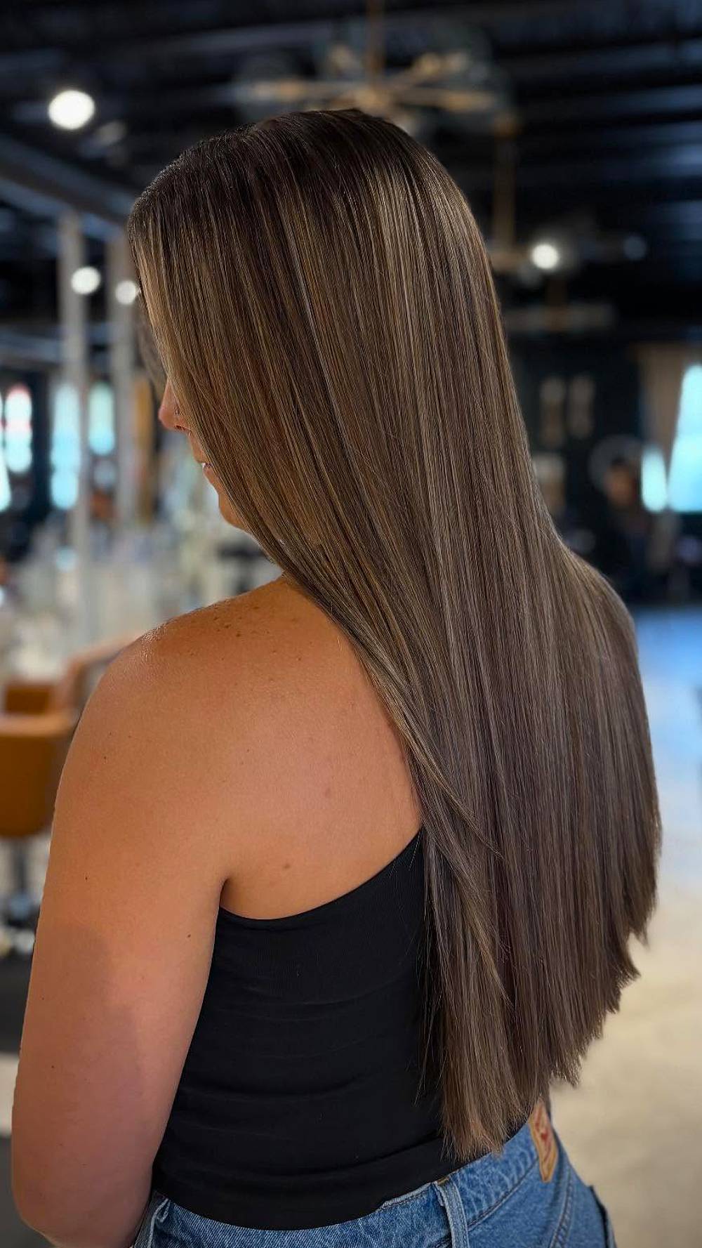 Elegant Long Brunette Layers with Subtle Dimension