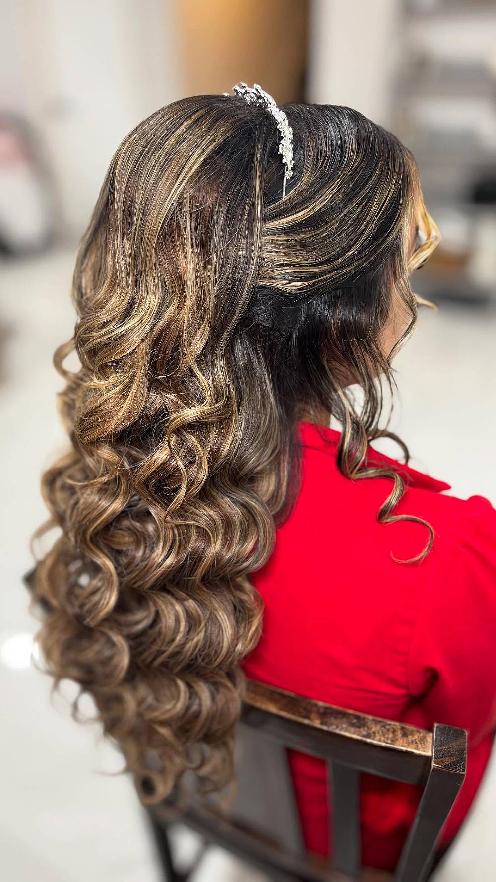 Glamorous Cascading Curls with Highlights