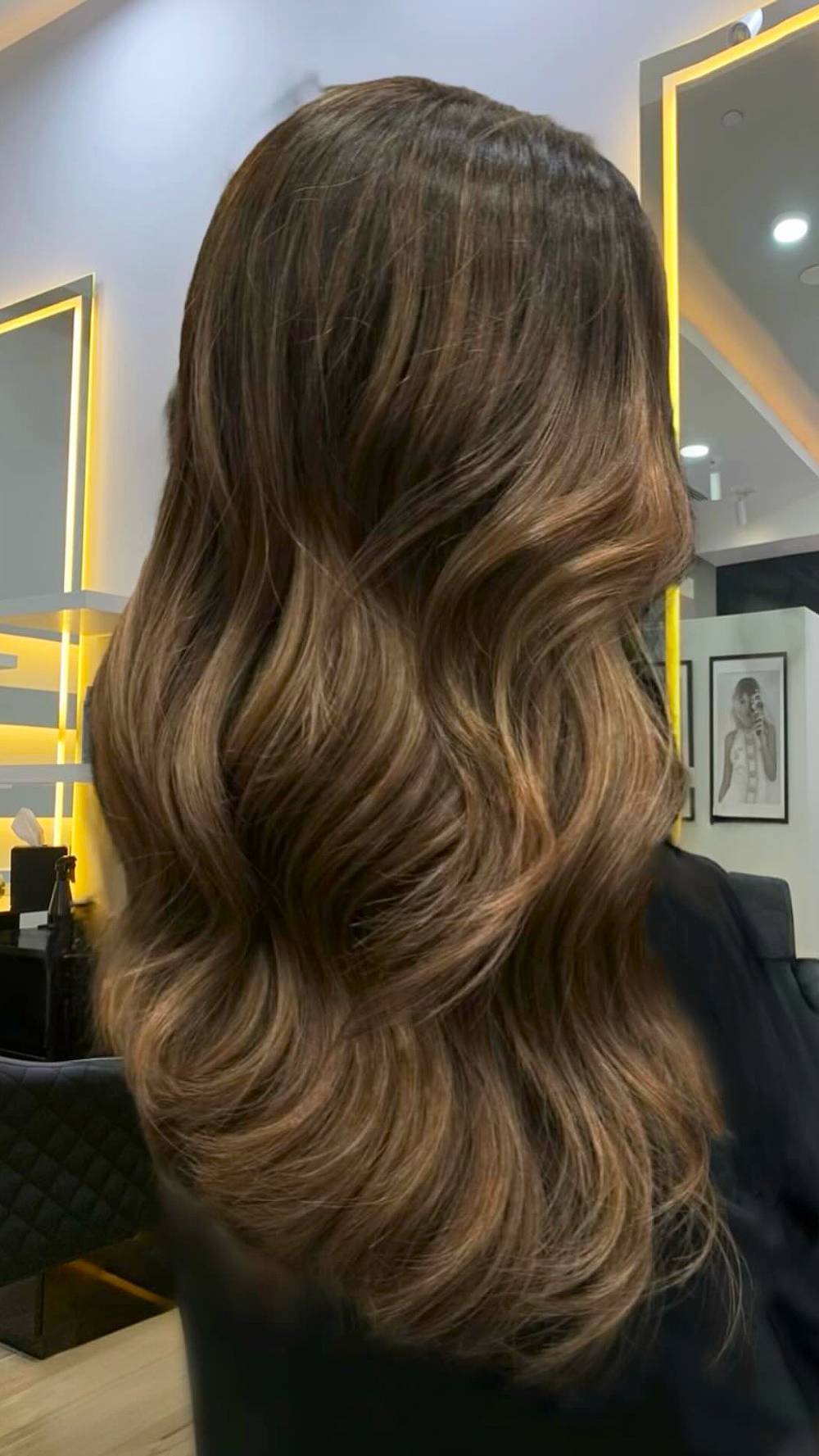 Luxurious Long Brunette Waves with Subtle Highlights